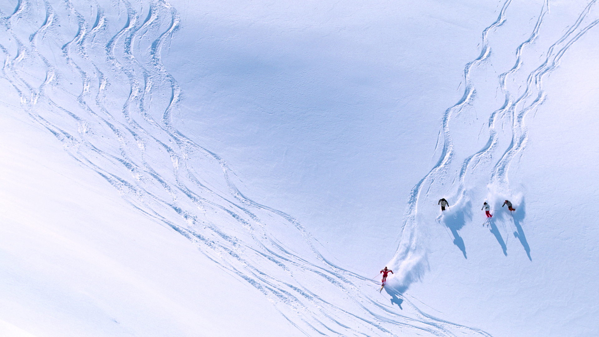 Luxury Ski & Snow, Aerial of skiers