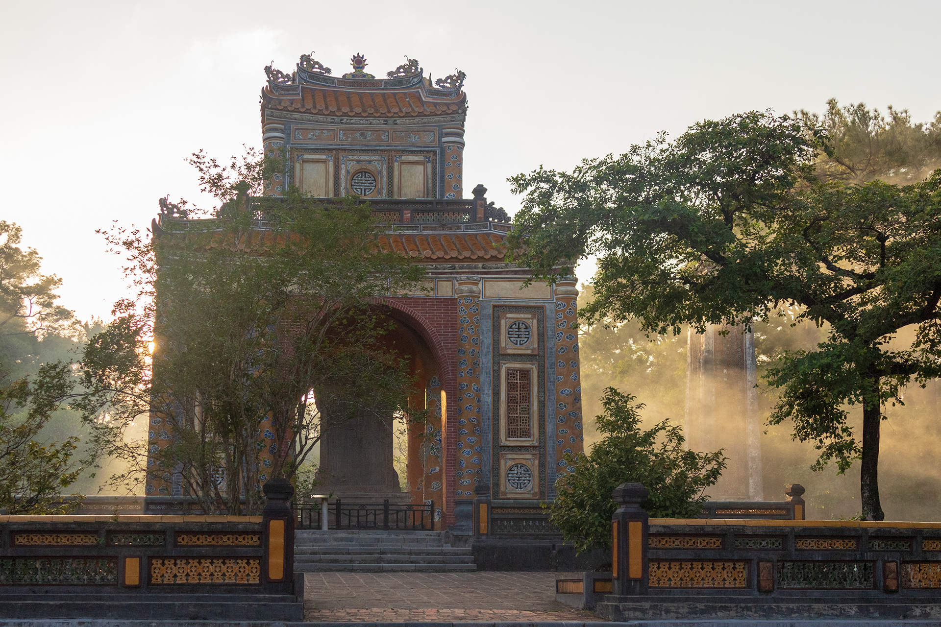 Patterned concrete archway of the Mausoleum of Emperor Tu Duc
