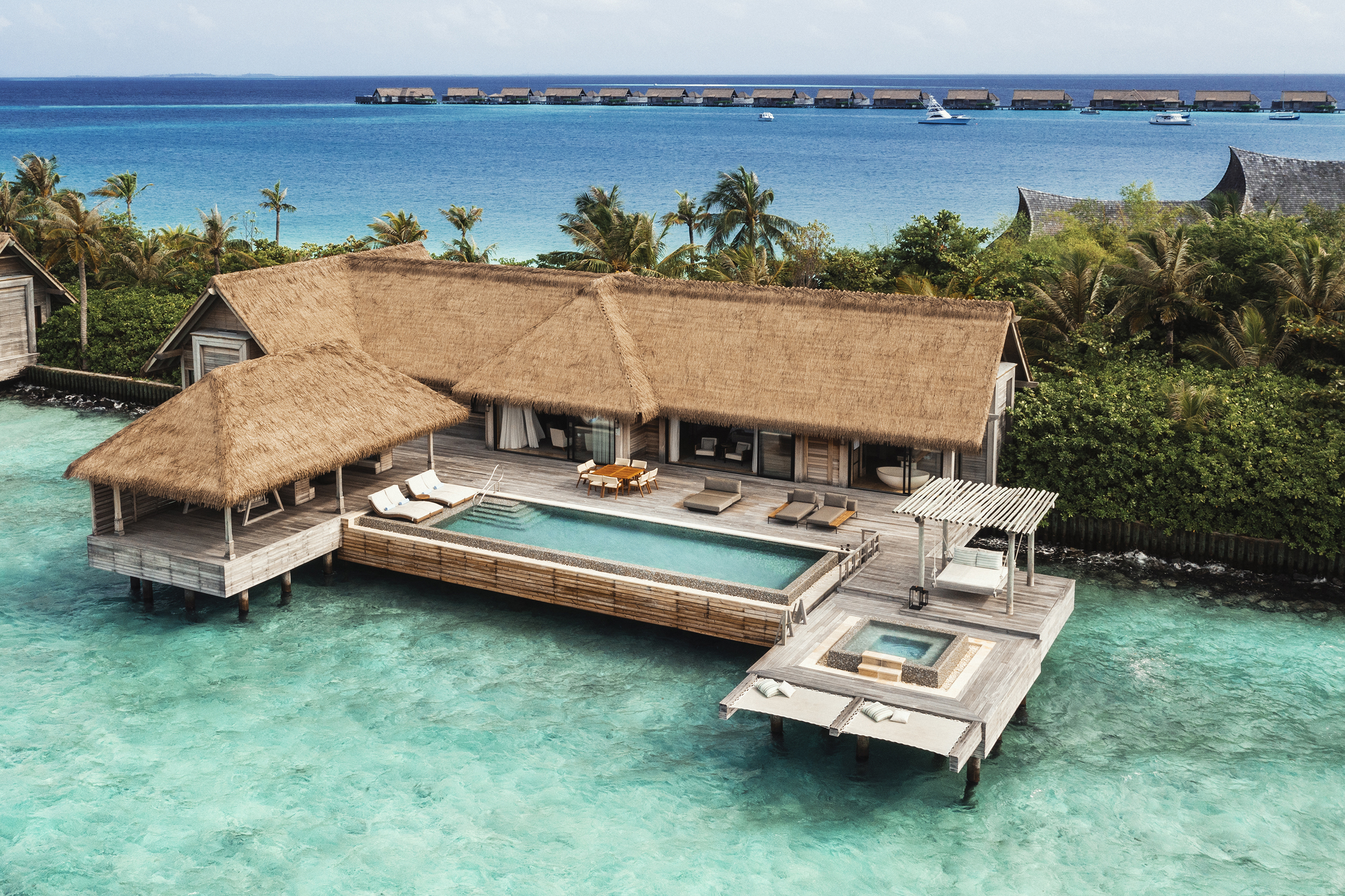 Exterior of two bedroom straw roofed Reef Villa with private pool and Jacuzzi 