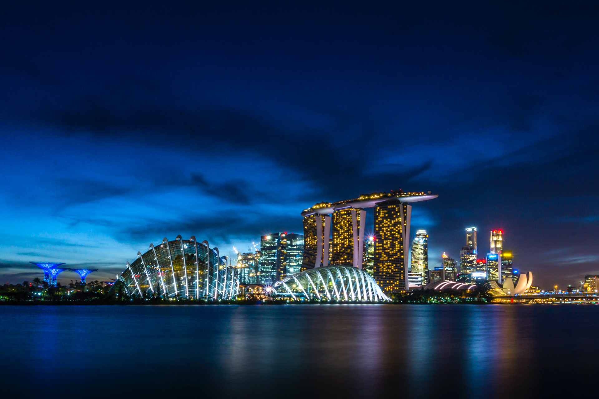 View across the water of Singapore city at night