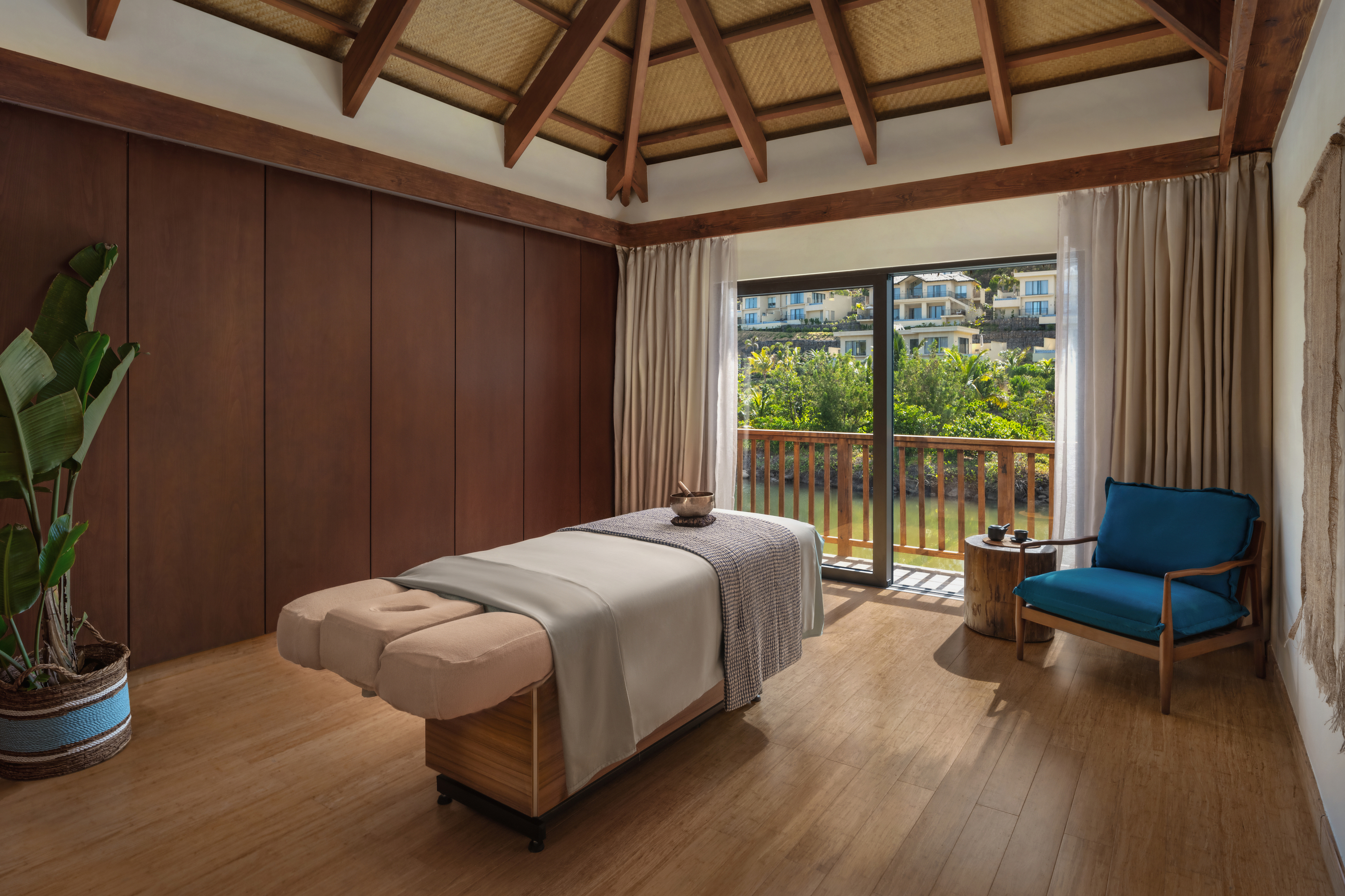 Calming wooden interior of a treatment room in the Six Senses Spa