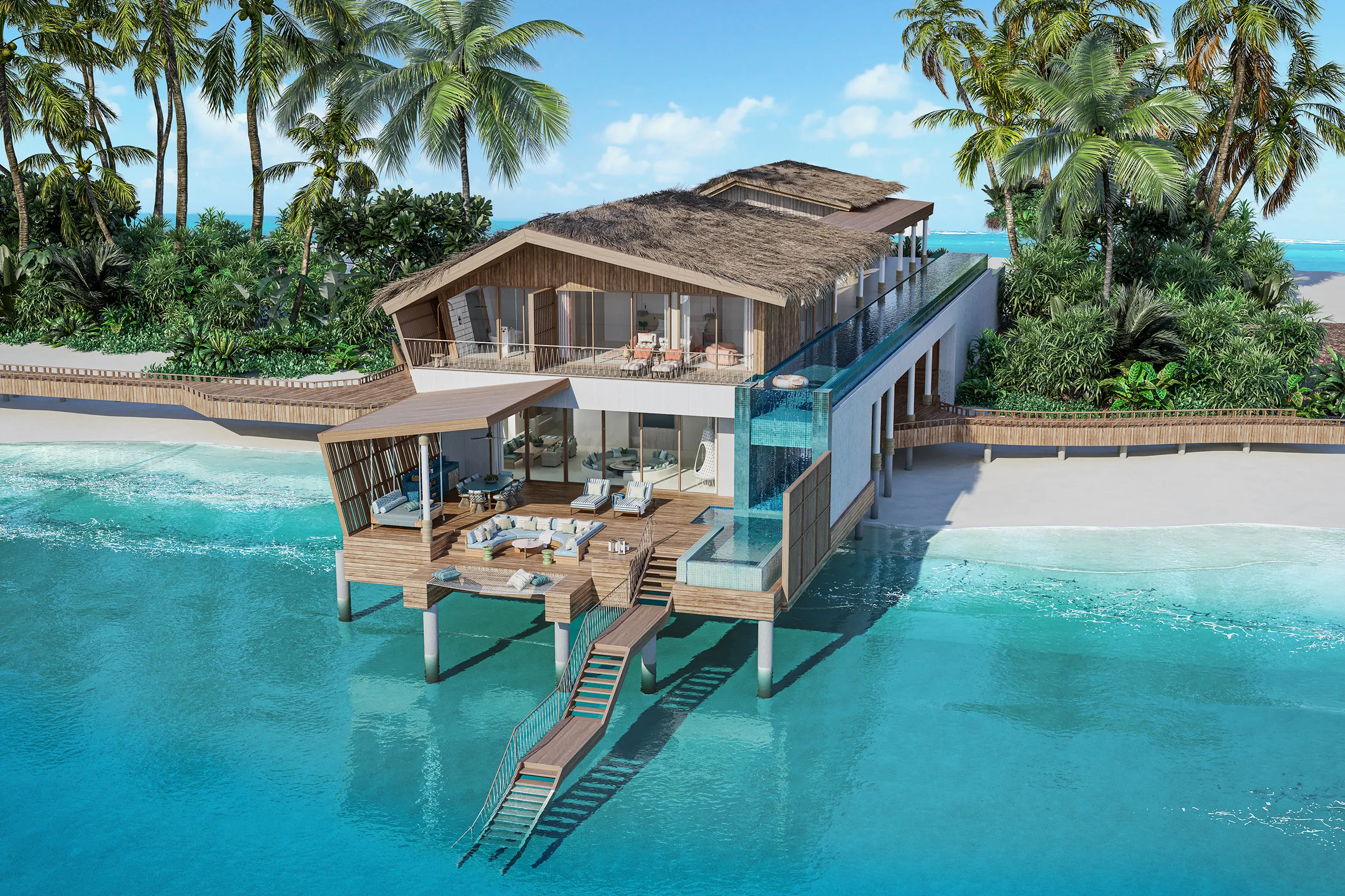 Overwater luxury villa at .Here Resort in the Maldives with private deck and turquoise lagoon views.