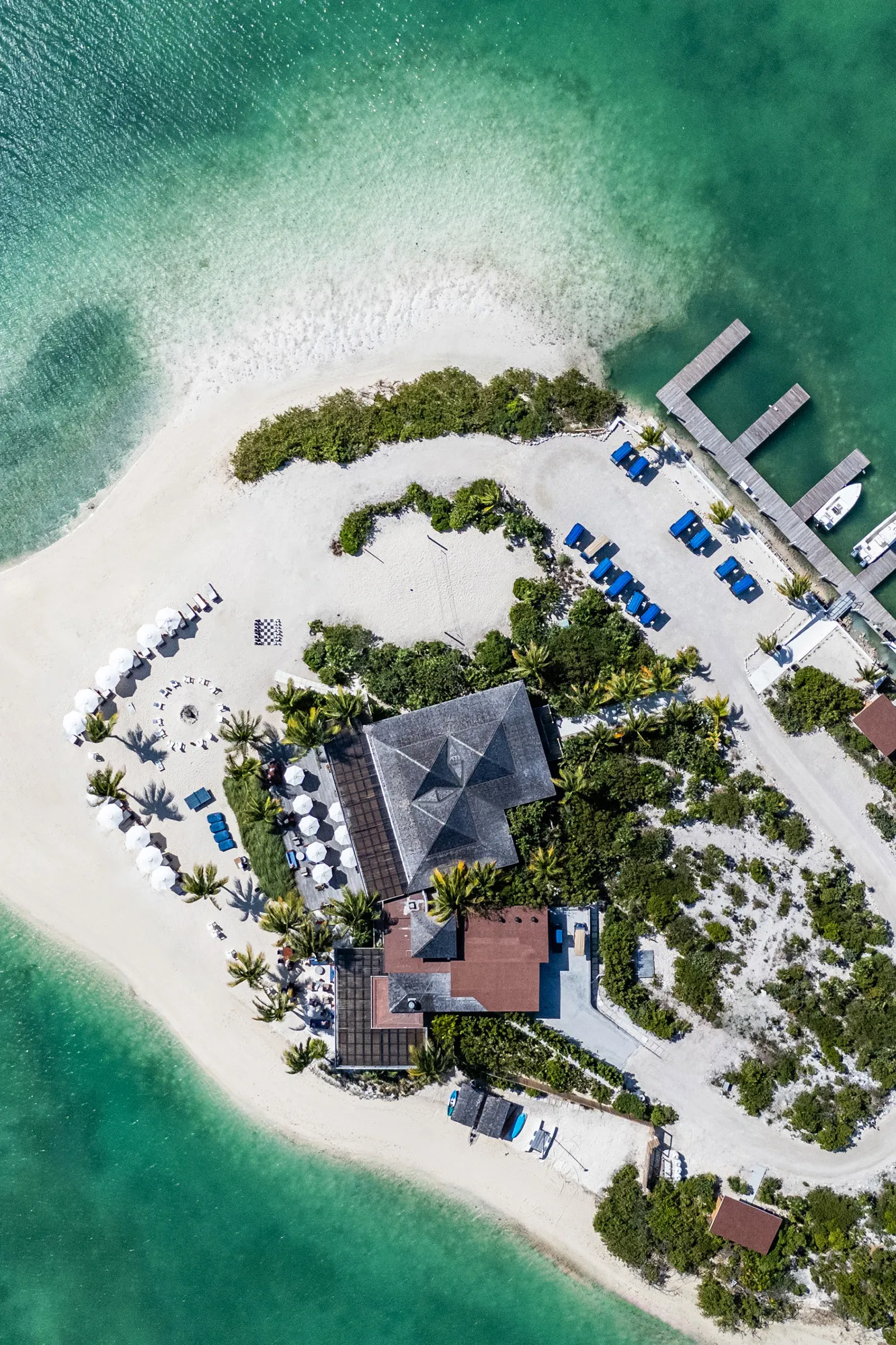 Birds eye aerial view of the Club House and marina at Ambergris Cay in Turks & Caicos