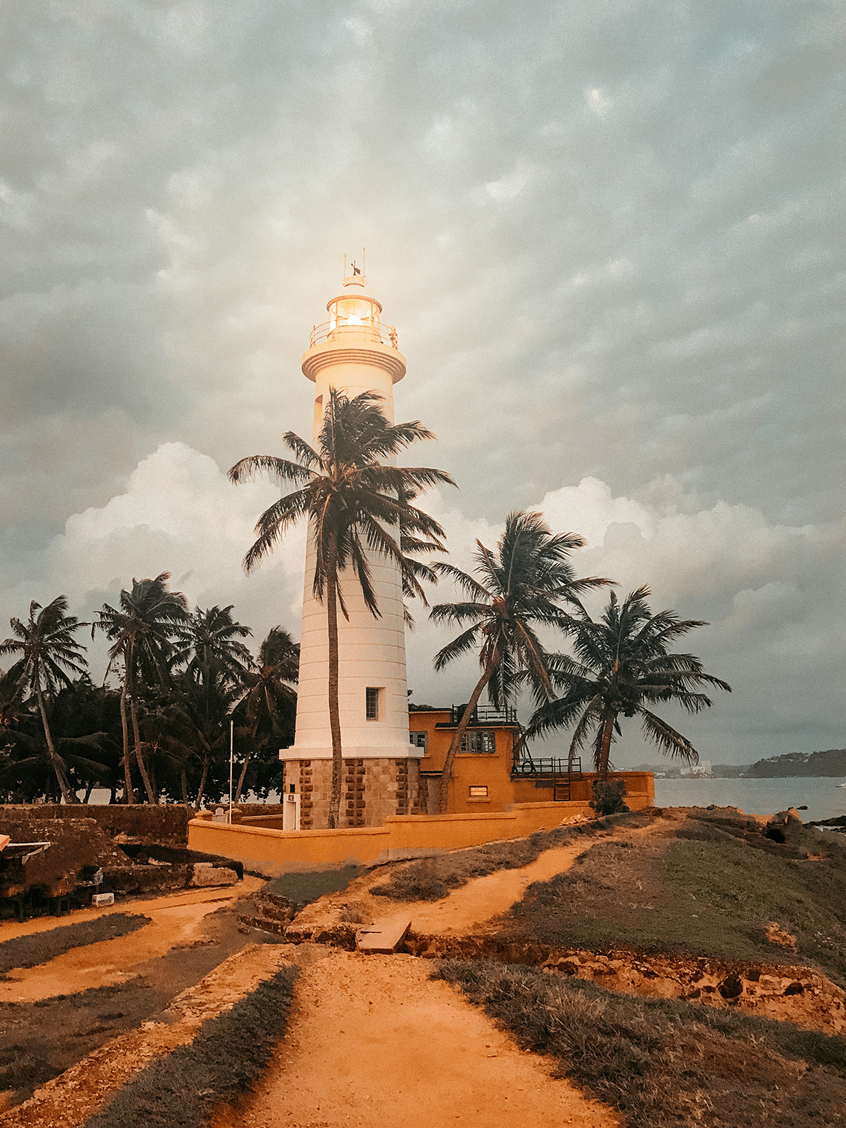 Asia, Sri Lanka, lighouse surrounded by palm trees