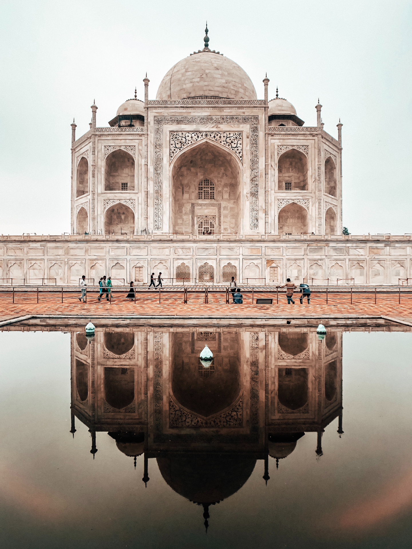 The building, Humayun's Tomb, with a domed roof and a pool of water