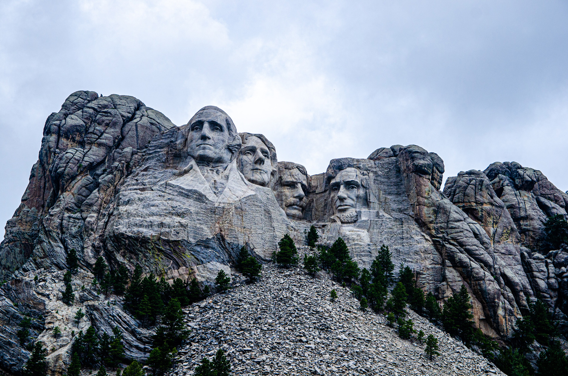 Granite faces depicting U.S. presidents carved into Mount Rushmore