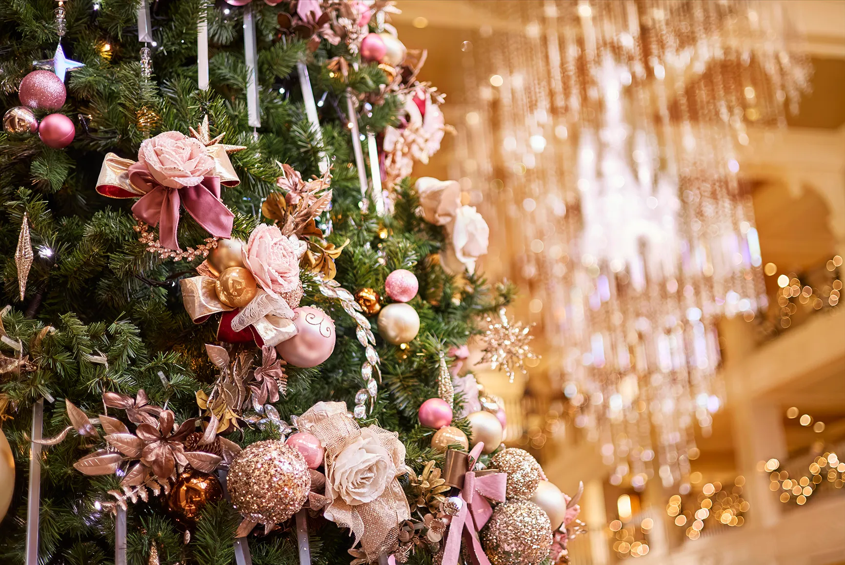 A close up of a christmas tree with pink decorations at The Disneyland Hotel in Paris 