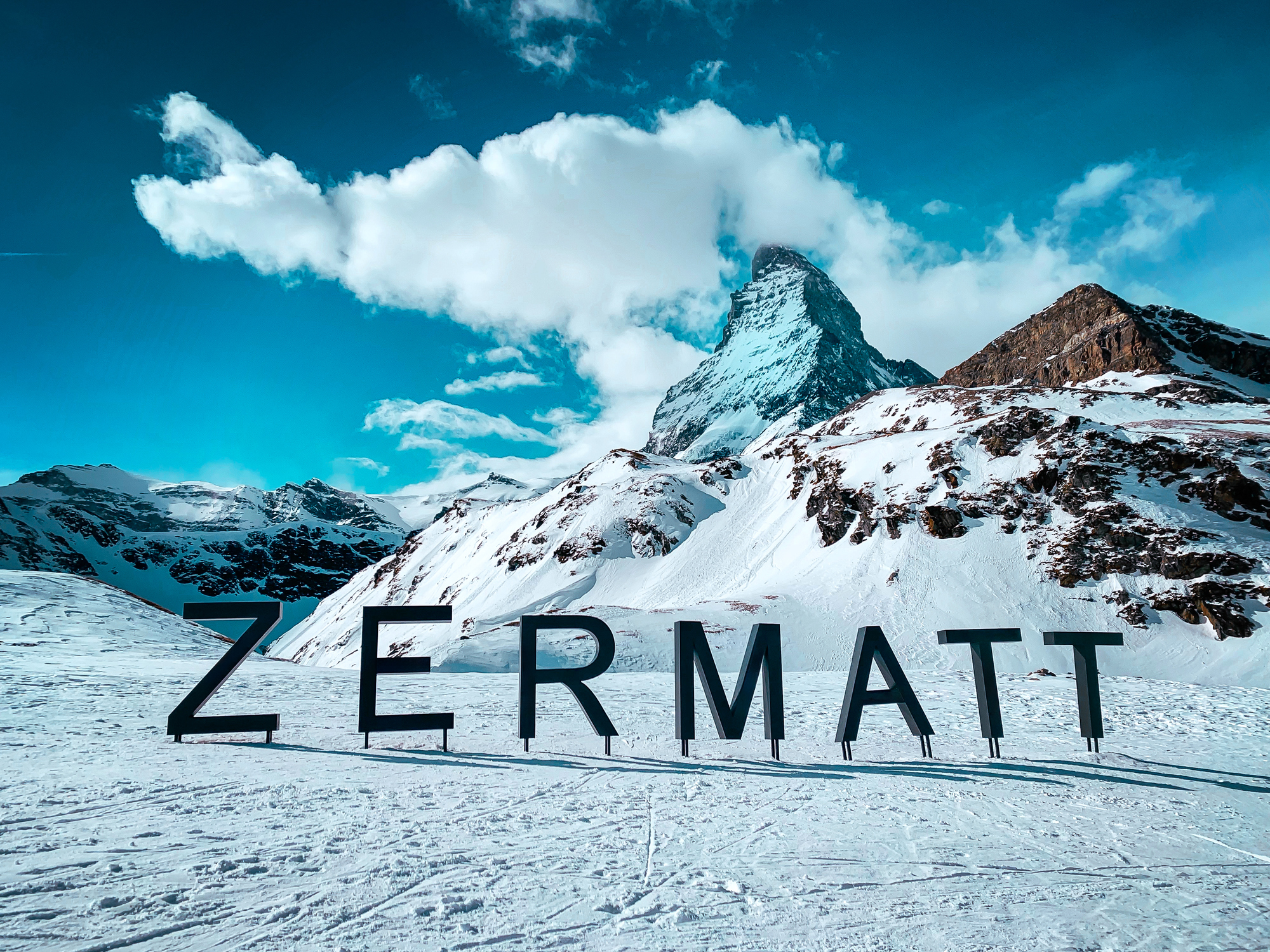 World famous mountain peak Matterhorn above Zermatt town in Mattertal, Valais canton, Switzerland, in winter.