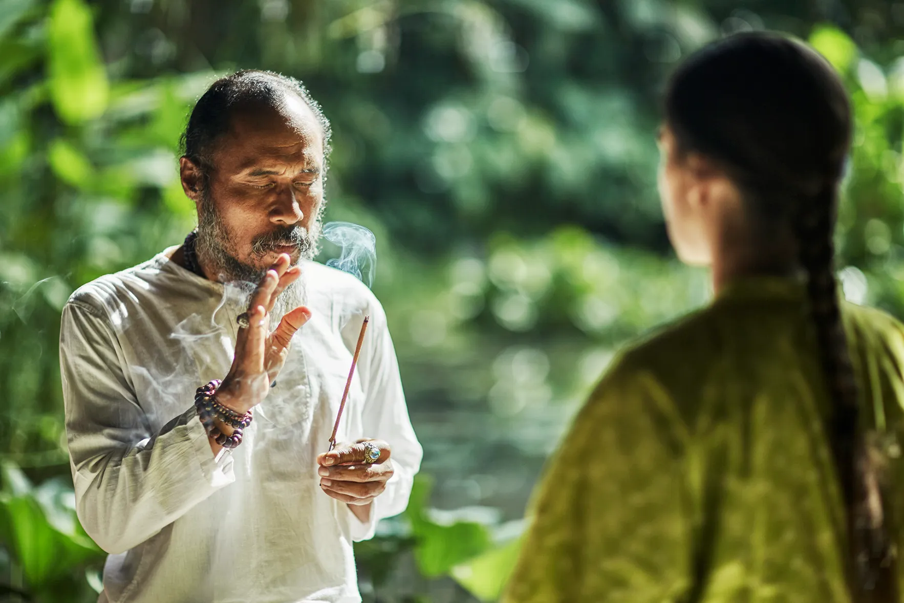 Djik Dewa holding inscense in a chakra balancing session at Four Seasons Resorts Bali at Sayan, Indonesia