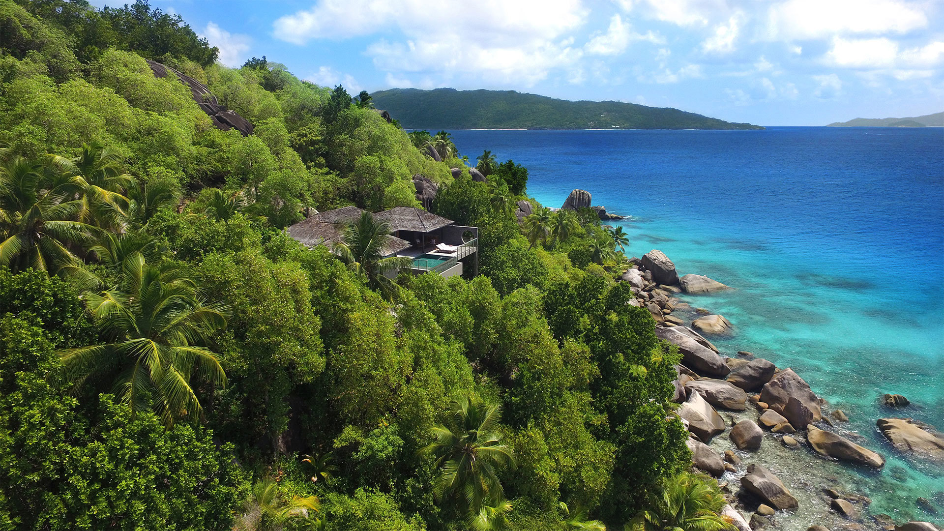 A villa perched between greenery at Six Senses Zil Pasyon