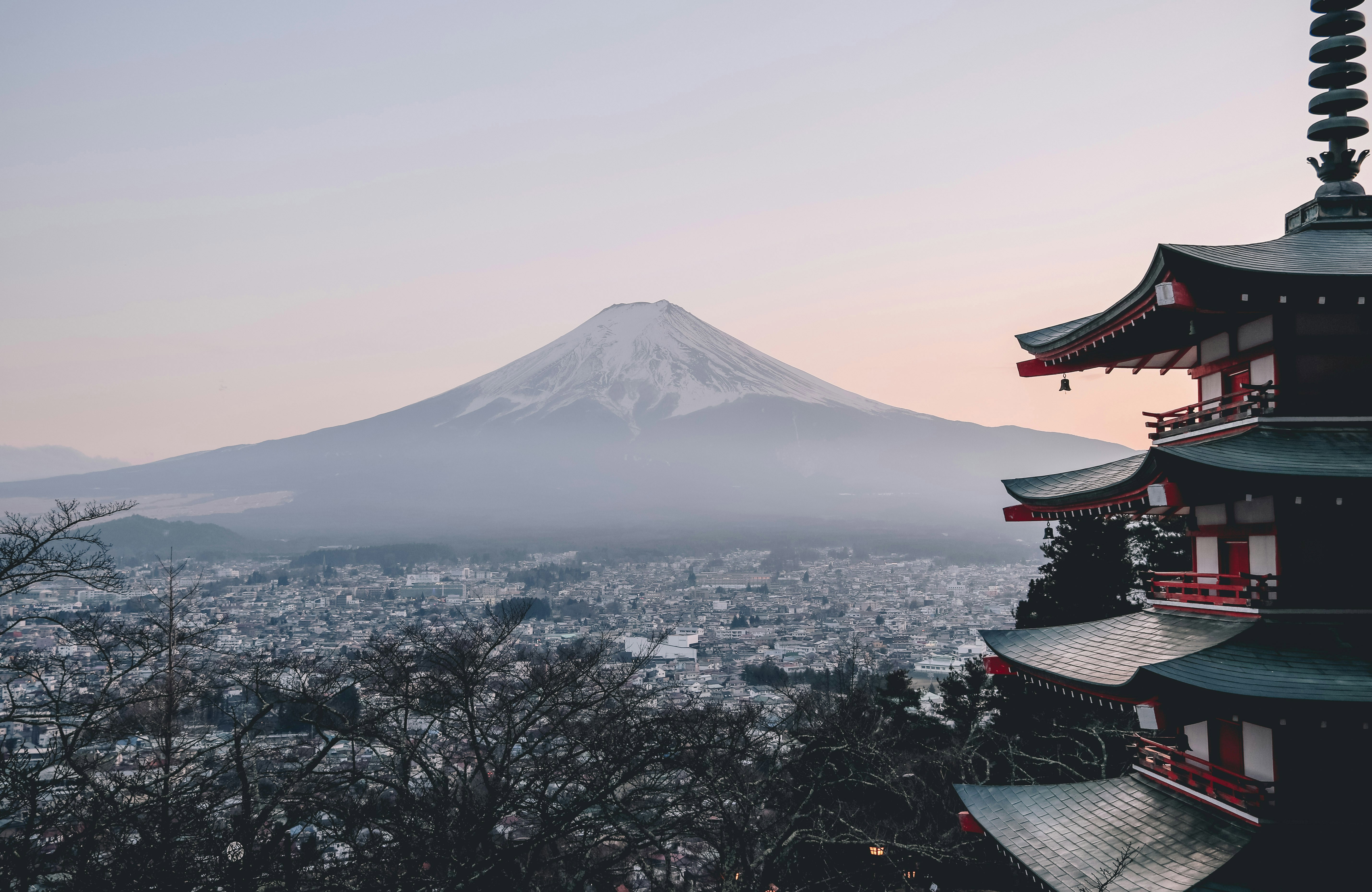 The view from Chureito Pagoda in Fujiyoshida looking down to the city and the snow-capped Mount Fuji beyond