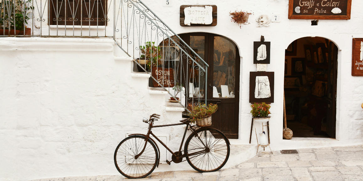 Europe, Italy, Puglia, Ostuni, bicycle on authentic whitewashed street