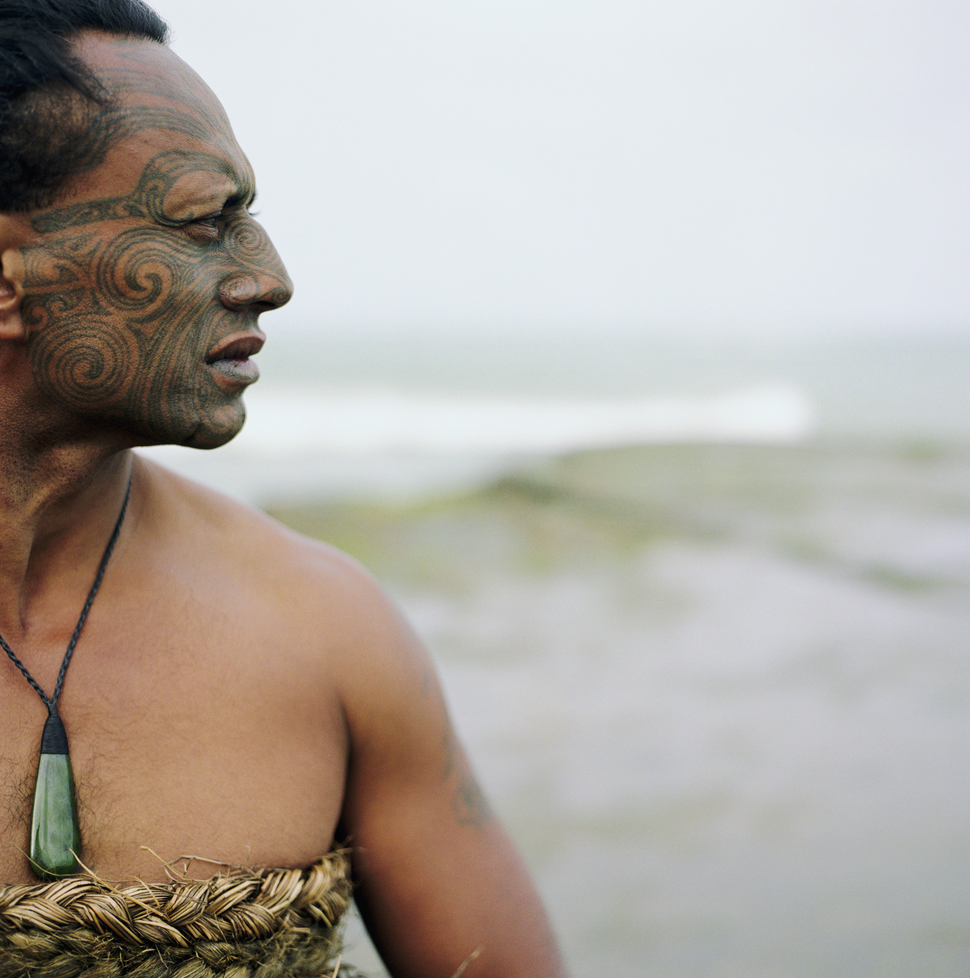 A Maori man with Ta Moko face tattoos