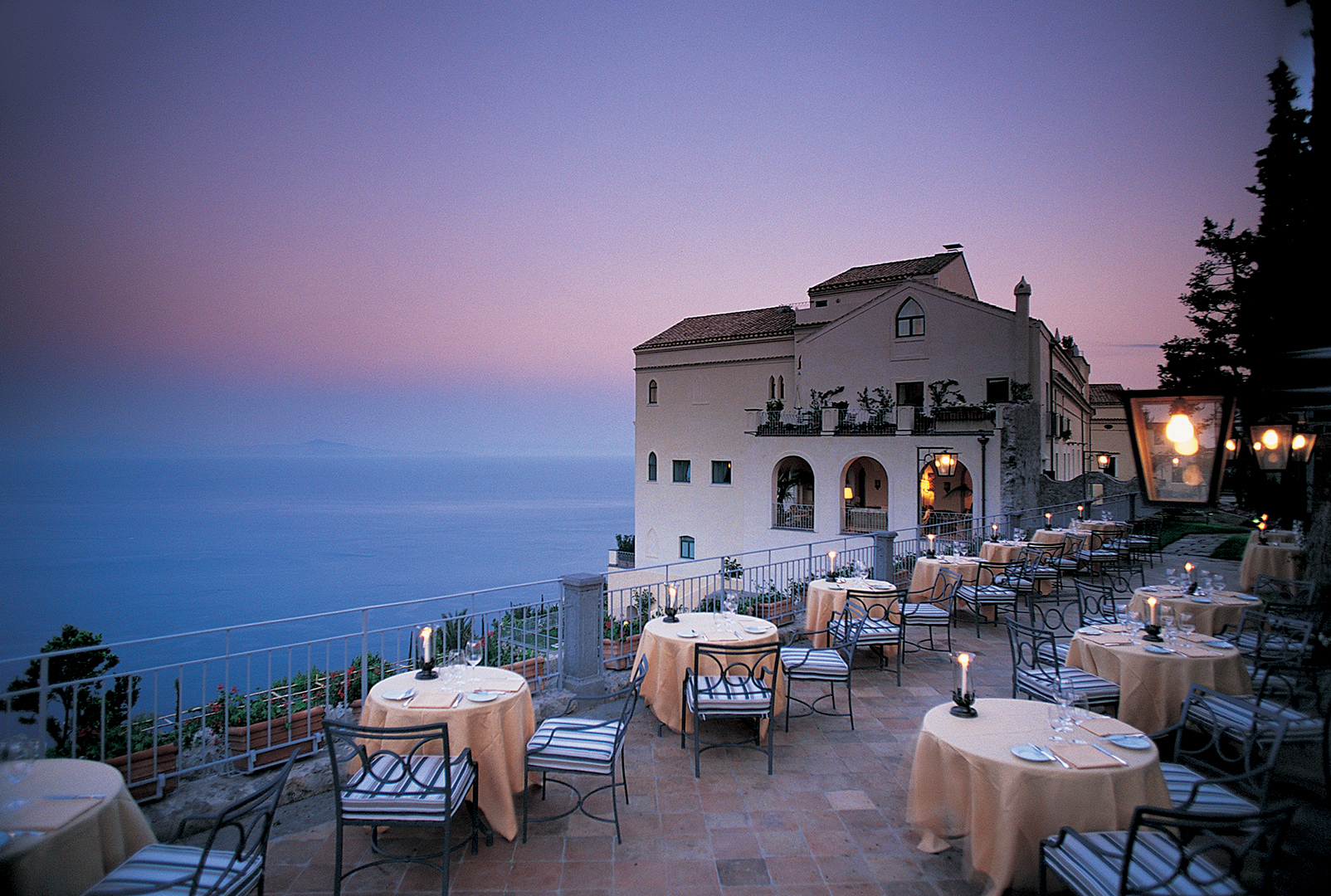 Europe, Italy, Amalfi Coast, Caruso, A Belmond Hotel, Amalfi Coast, The Belverdere restaurant at sunset