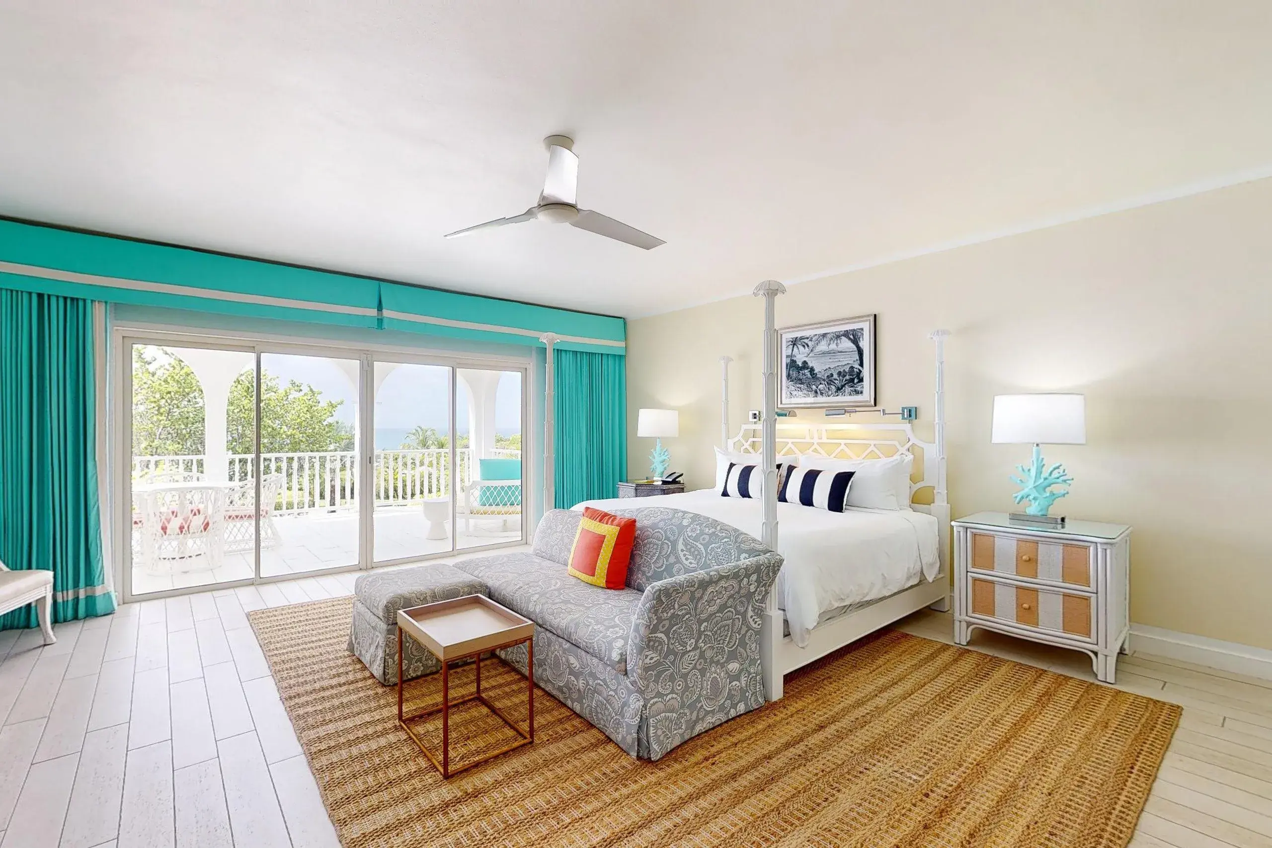 Luxury guest room at Malliouhana Resort, Anguilla, featuring elegant Caribbean-inspired décor, a private terrace, and tranquil ocean views