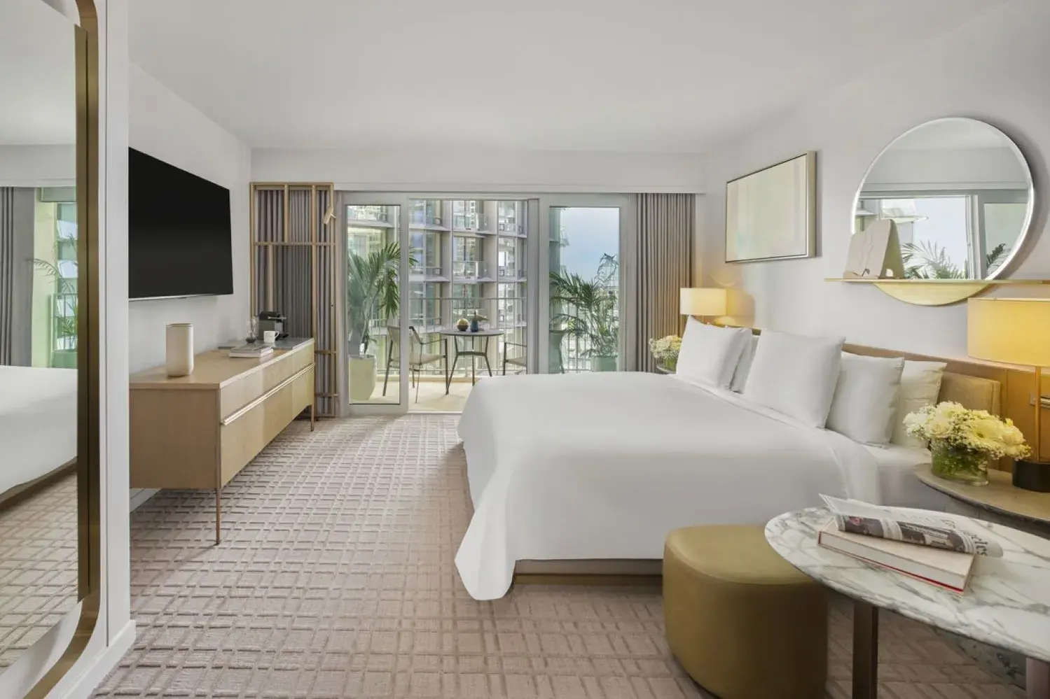 Bright, contemporary Century Plaza Room at Fairmont Century Plaza in Los Angeles featuring a plush king bed, modern décor, and a private balcony with city and palm views.