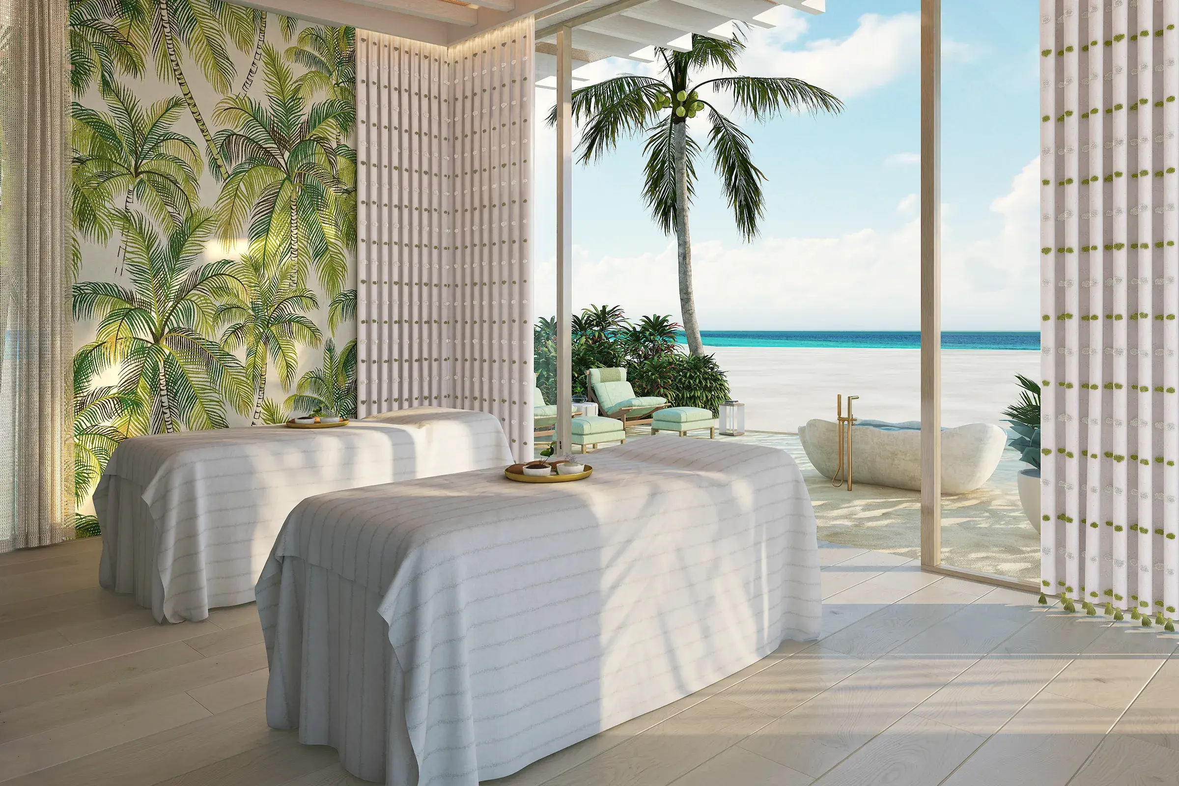 Beachfront spa treatment room at .Here Resort in the Maldives with ocean views and tropical décor.