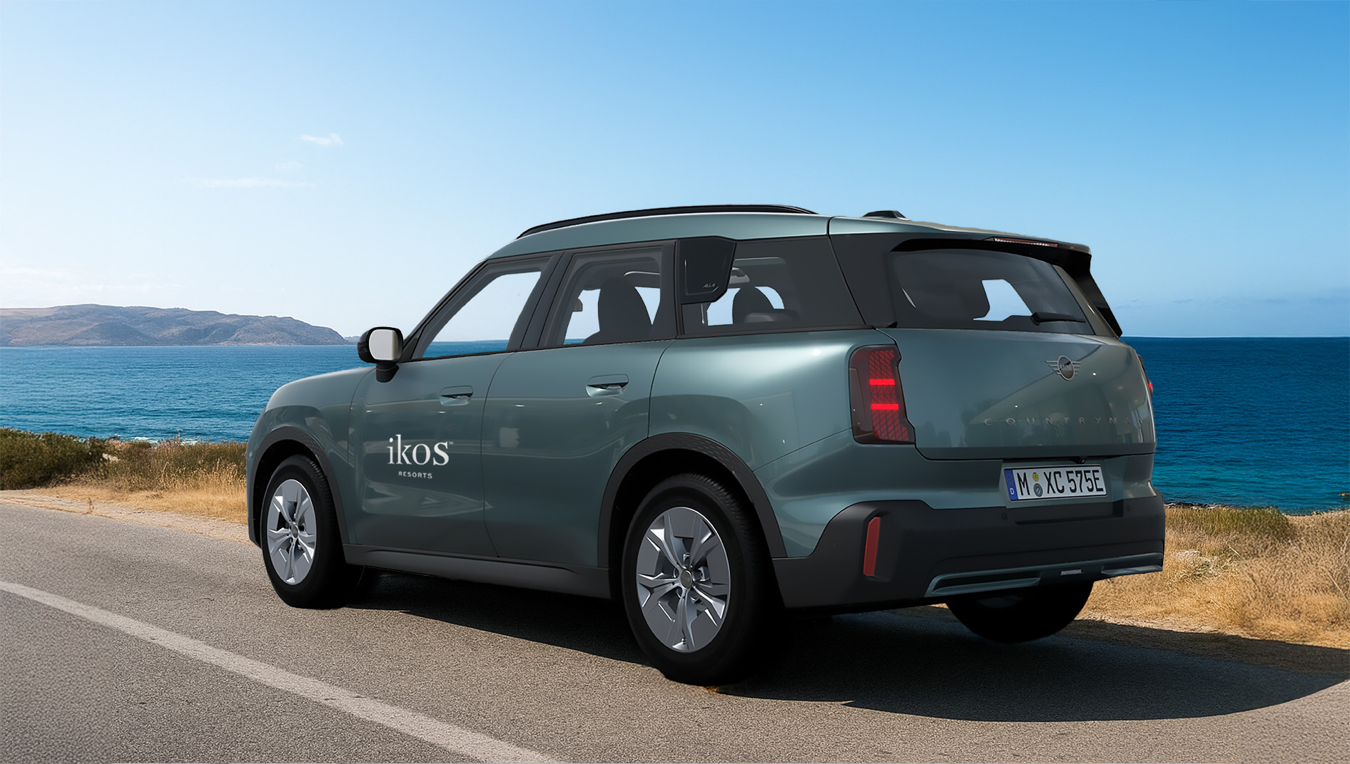 A Mini Countryman car in a seaside road at Ikos Porto Petro in Spain