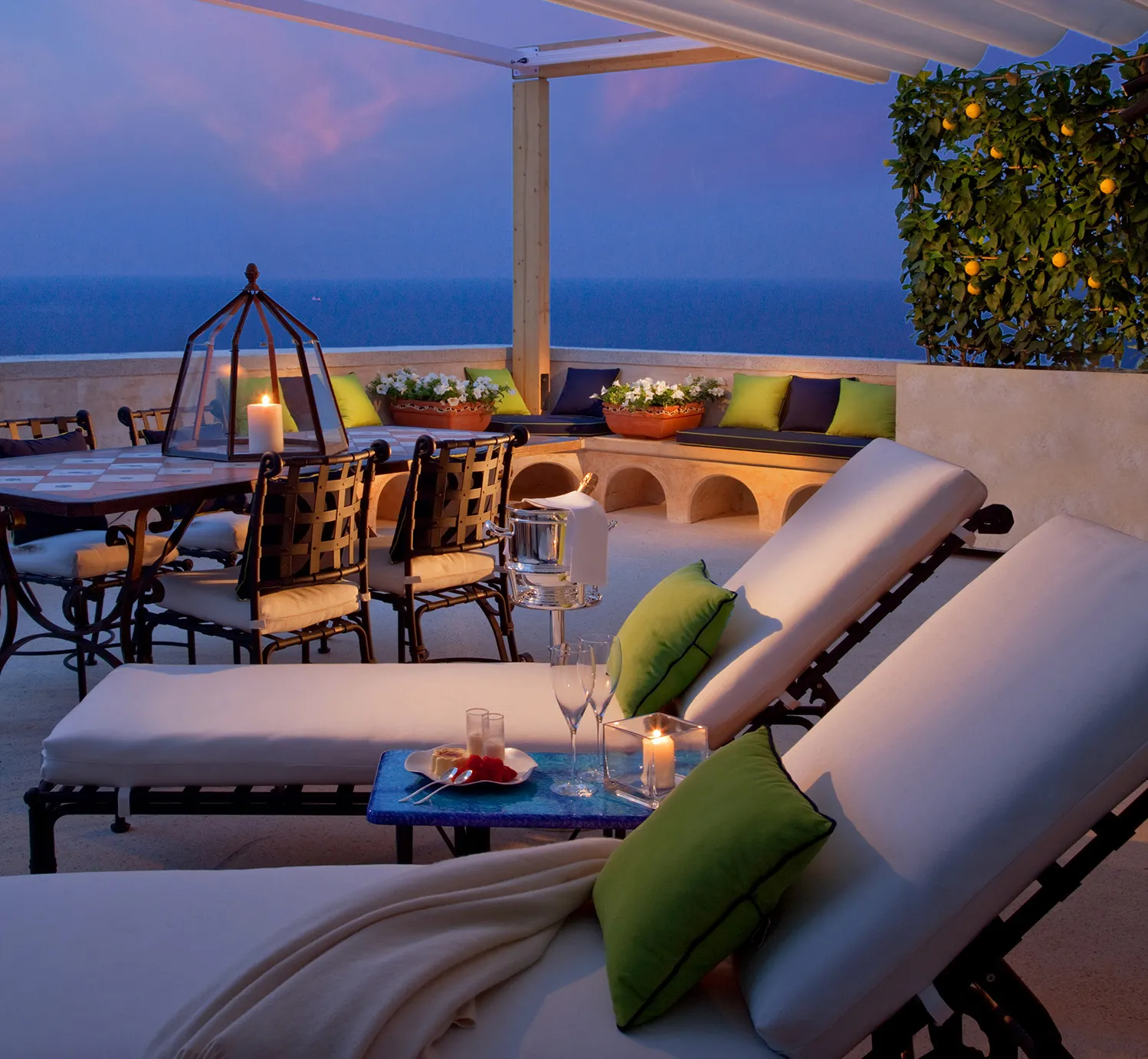 Europe, Italy, Amalfi Coast, Monastero Santa Rosa, outdoor terrace seating and two sun loungers