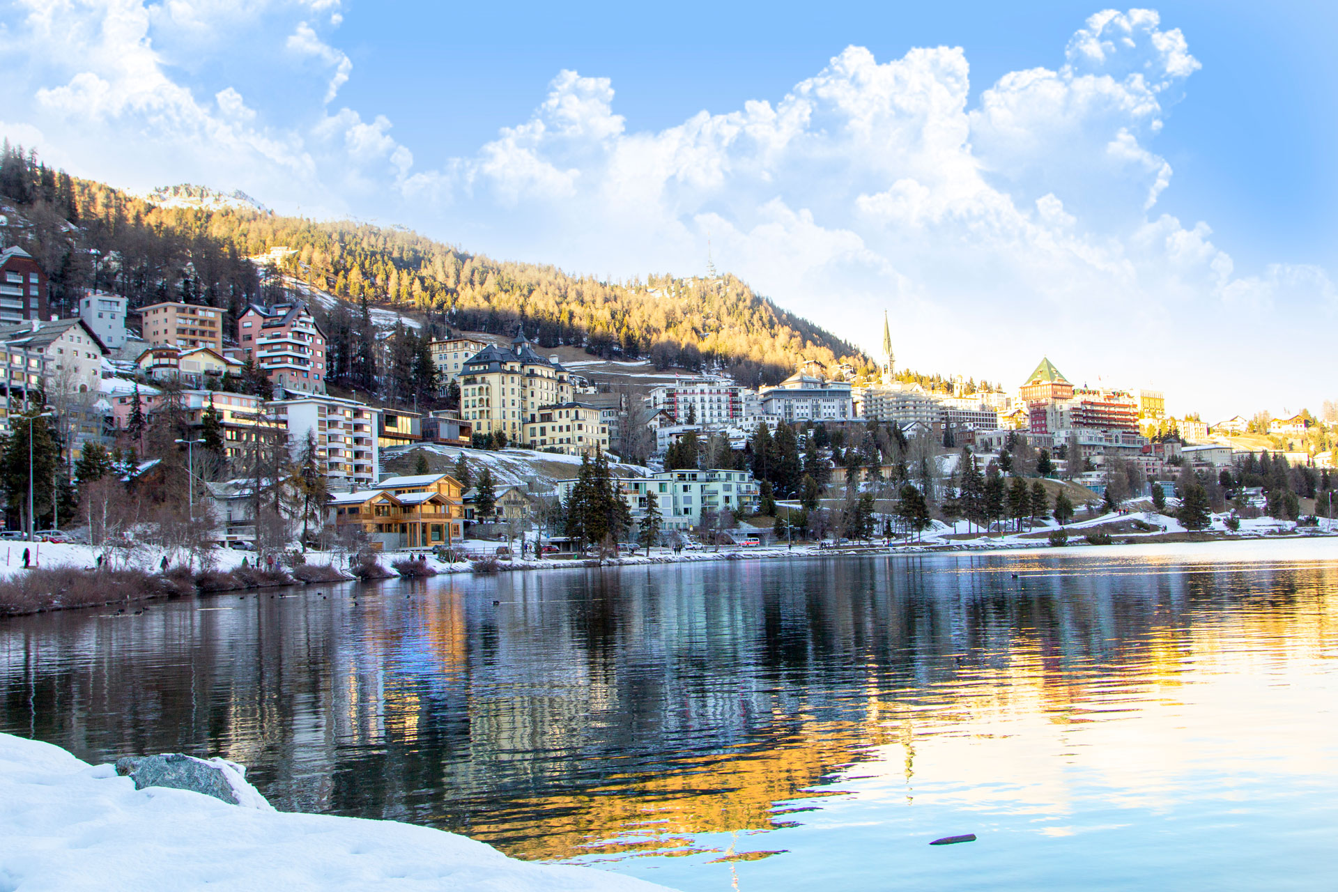A view of the town of St Moritz from waters edge