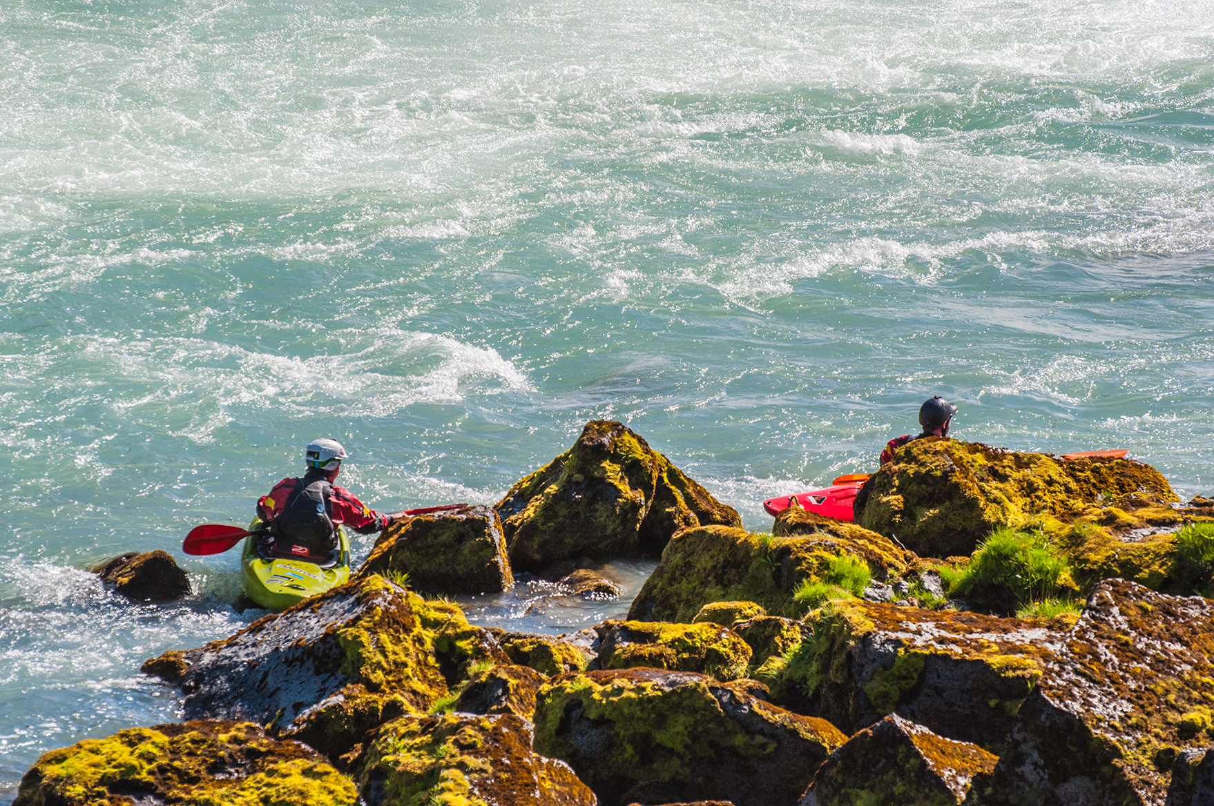 Two people whitewater rafting