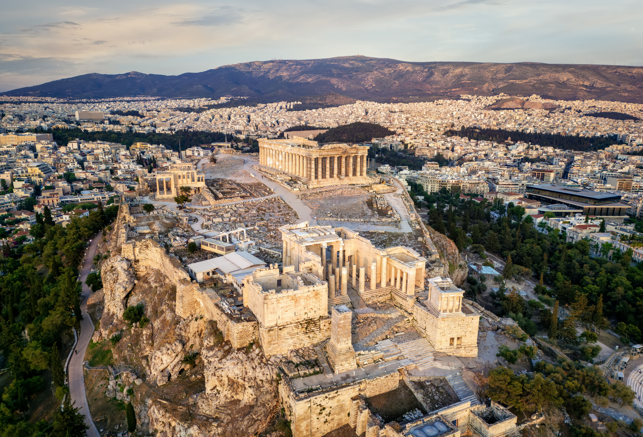 An aerial view of Athens with its Acropolis buildings at the focus