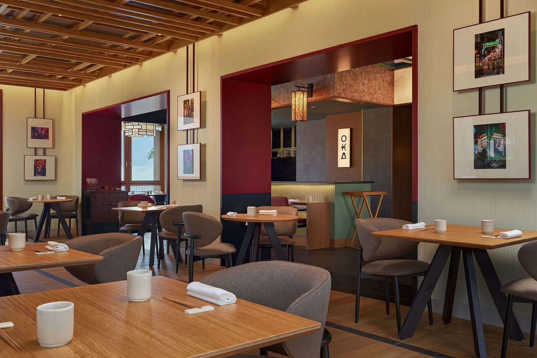 Elegant dining area at Gran Hotel Taoro in Tenerife featuring modern wood accents, contemporary artwork, and a stylish open-view restaurant design.