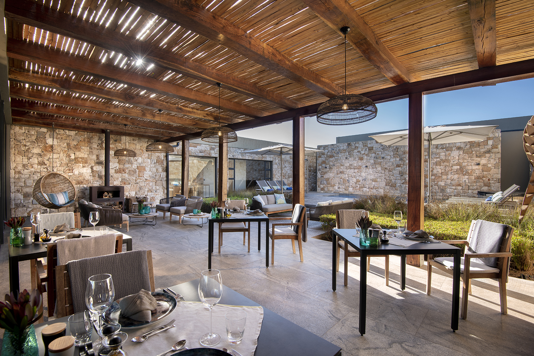 Africa, South Africa, Morukuru Family De Hoop Nature Reserve, Beach Lodge Courtyard dining tables
