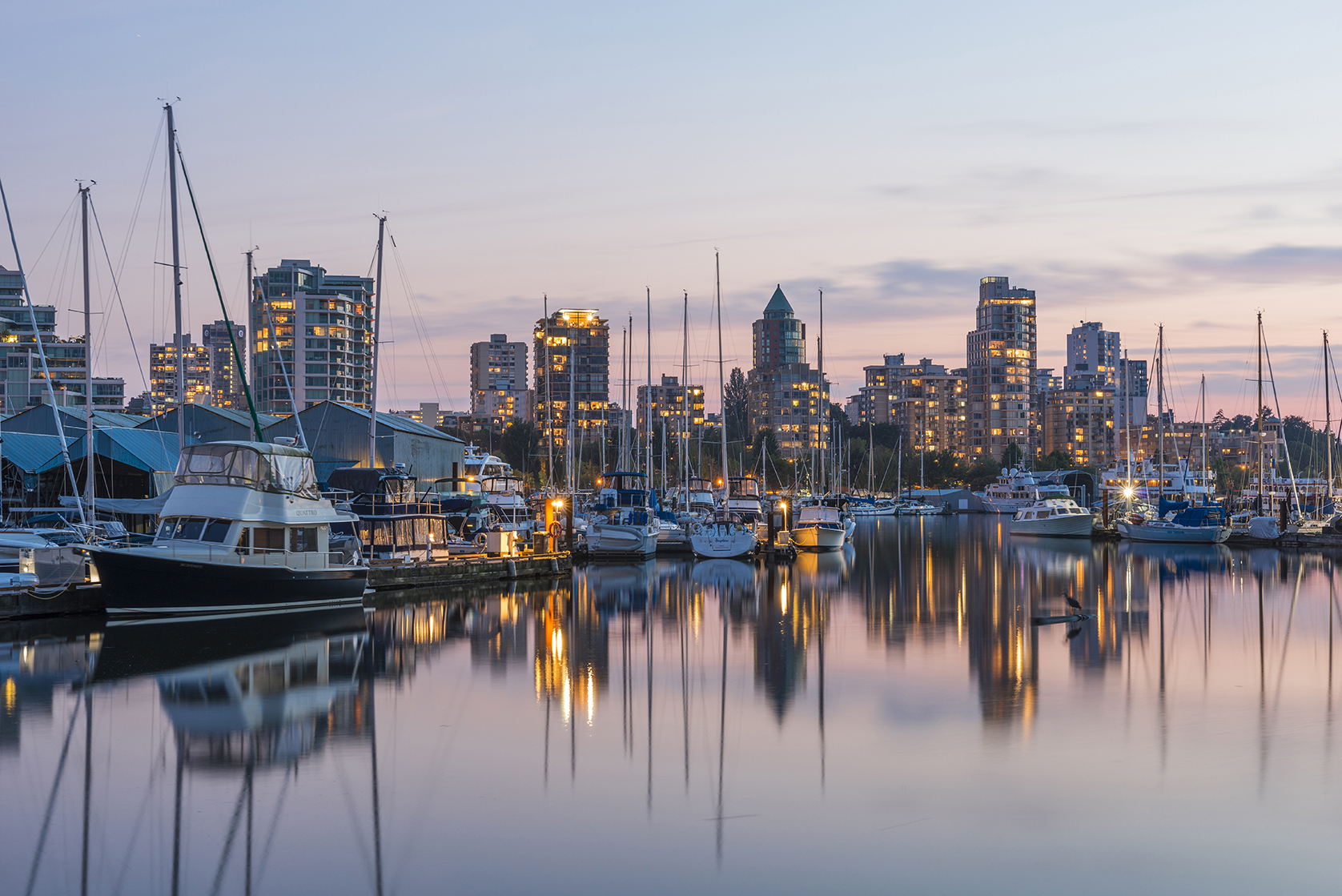 Vancouver harbour with boats at sunset