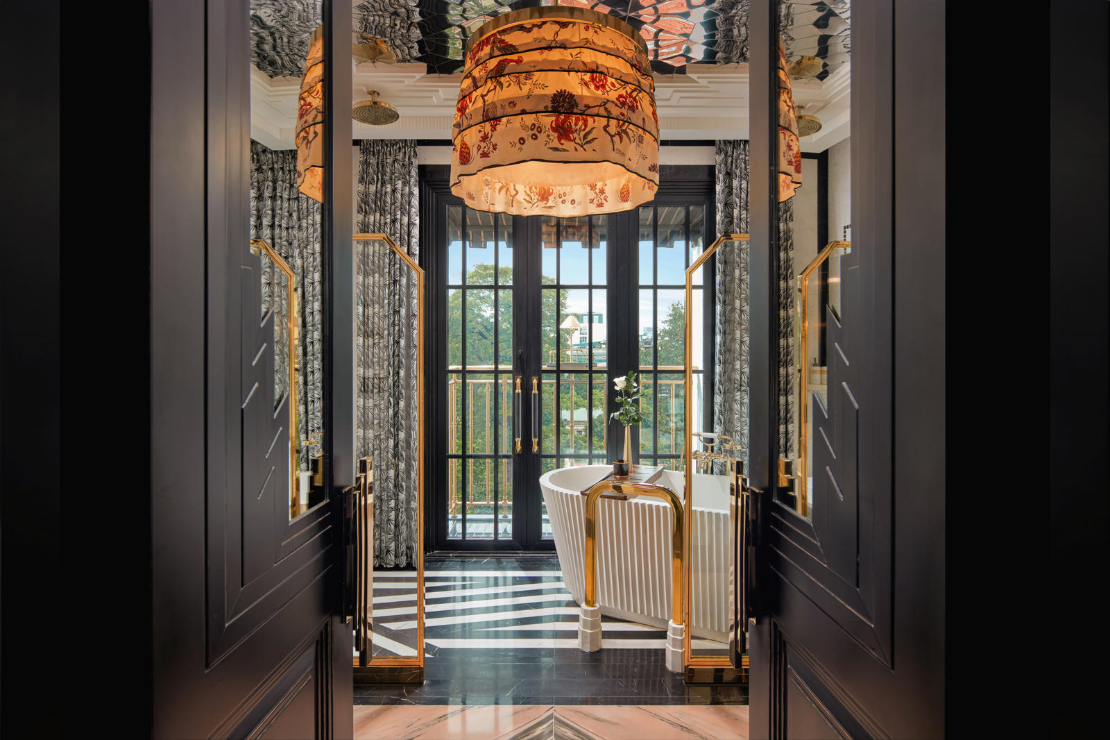 Asia, Vietnam, Hanoi, Capella Hanoi, view through double doors into Terrace Opera suite bathroom