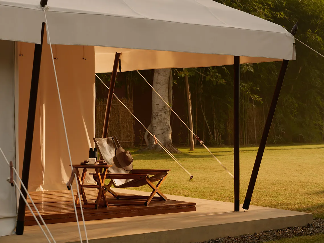 Asia, India, Aman-i-Khas, chair and side table with tea on a tent veranda