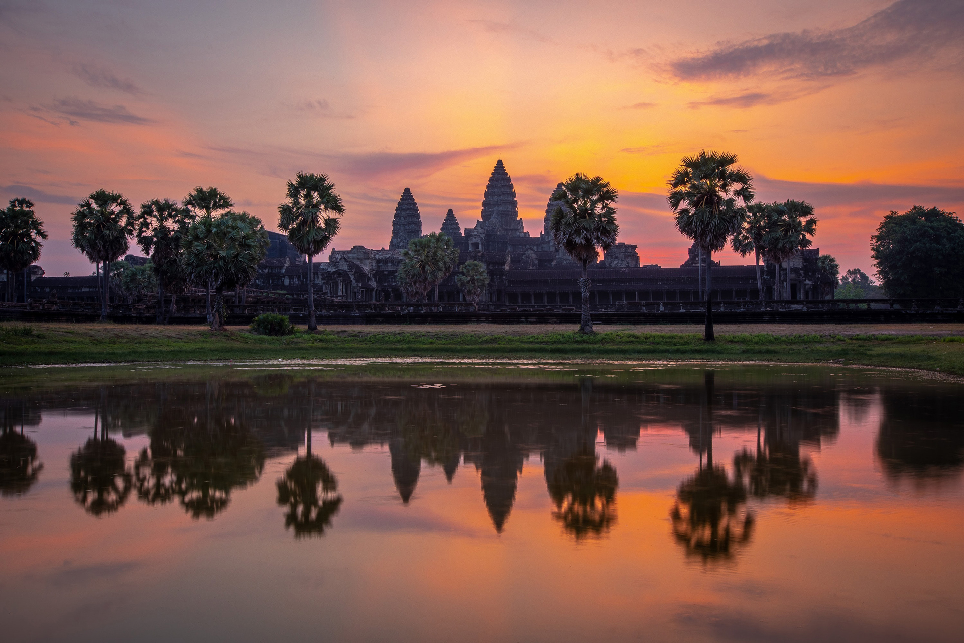 Angkor Wot temple as the sun sets behind it