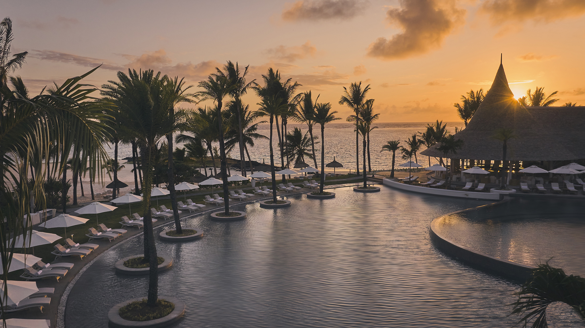 Indian Ocean, Mauritius, LUX* Belle Mare, pool at sunrise 