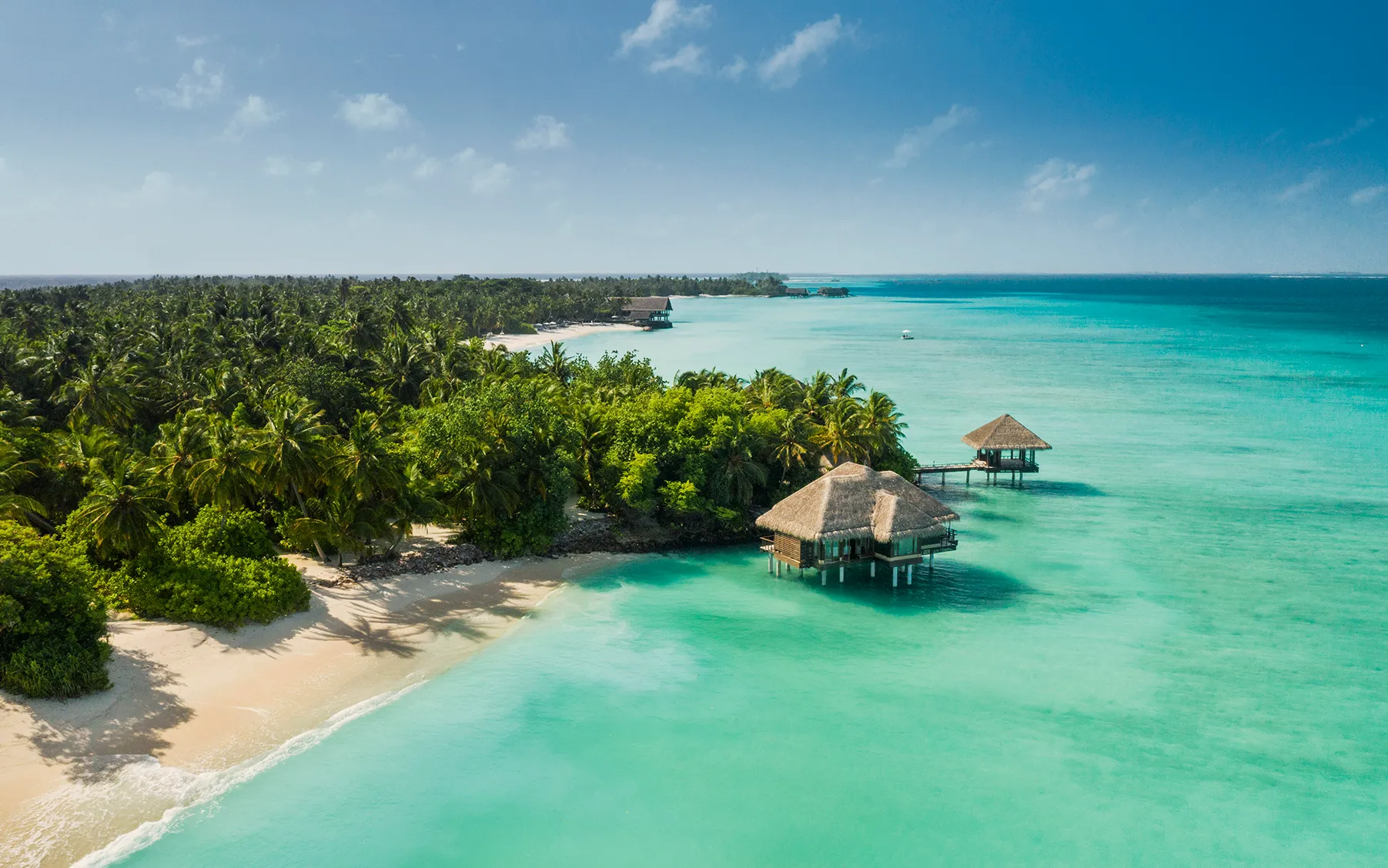 Exterior view of the overwater spa buildings at One&only Reethi Rah, Maldives