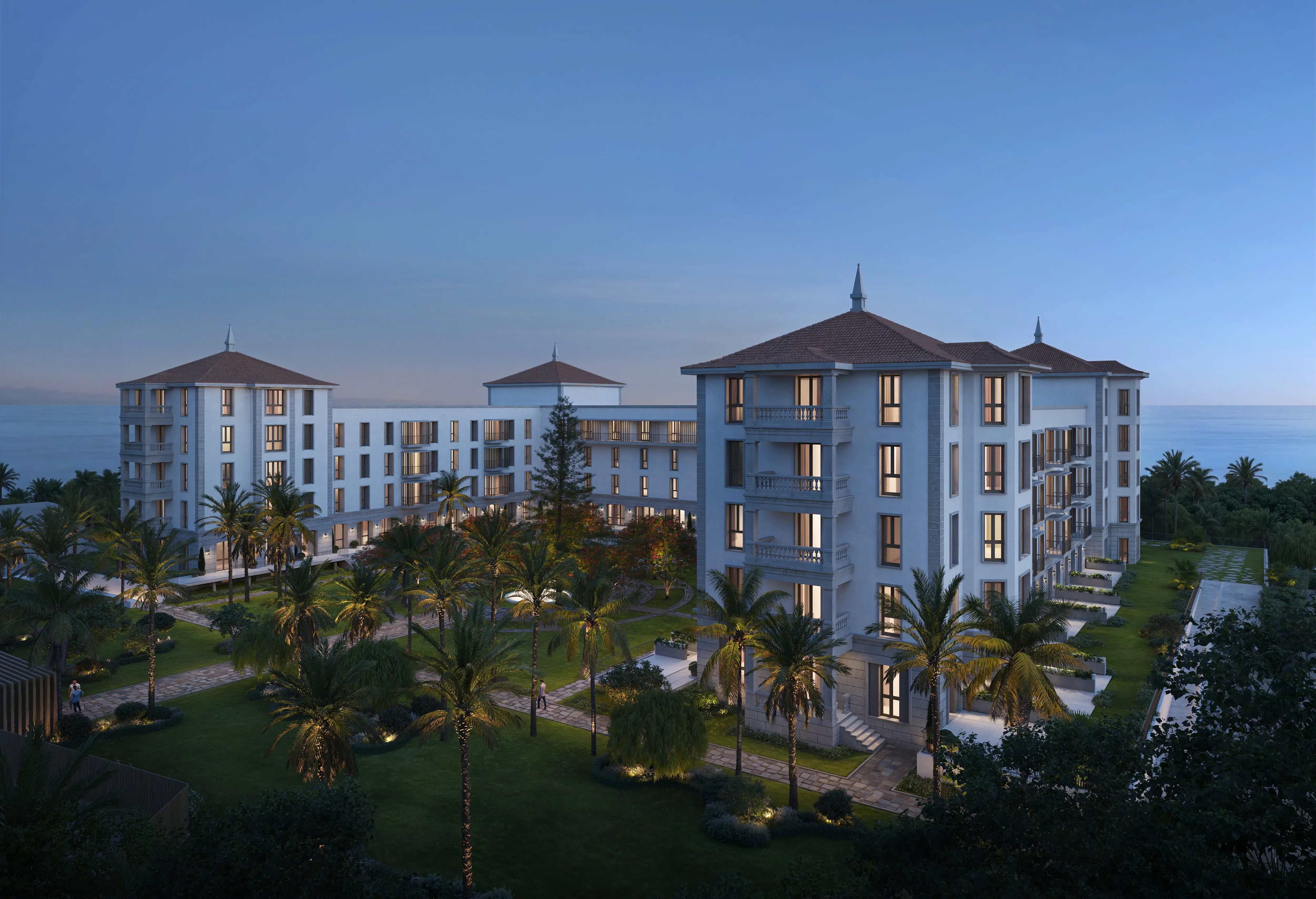 Elegant exterior of Gran Hotel Taoro in Tenerife overlooking lush gardens during dusk.