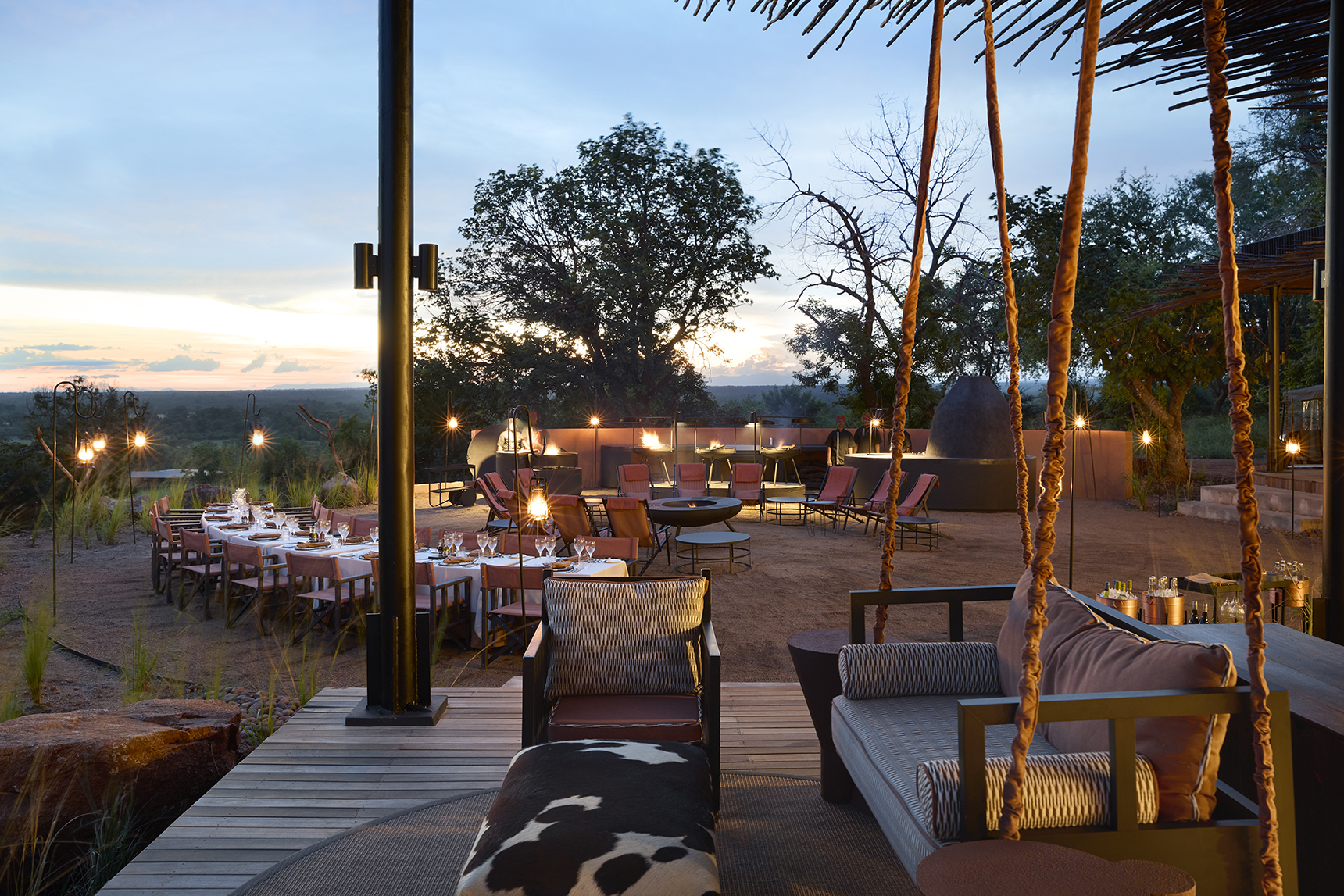 Afirca, Zambia, Chichele Presidential, swing chair and outdoor dining and firepit set up