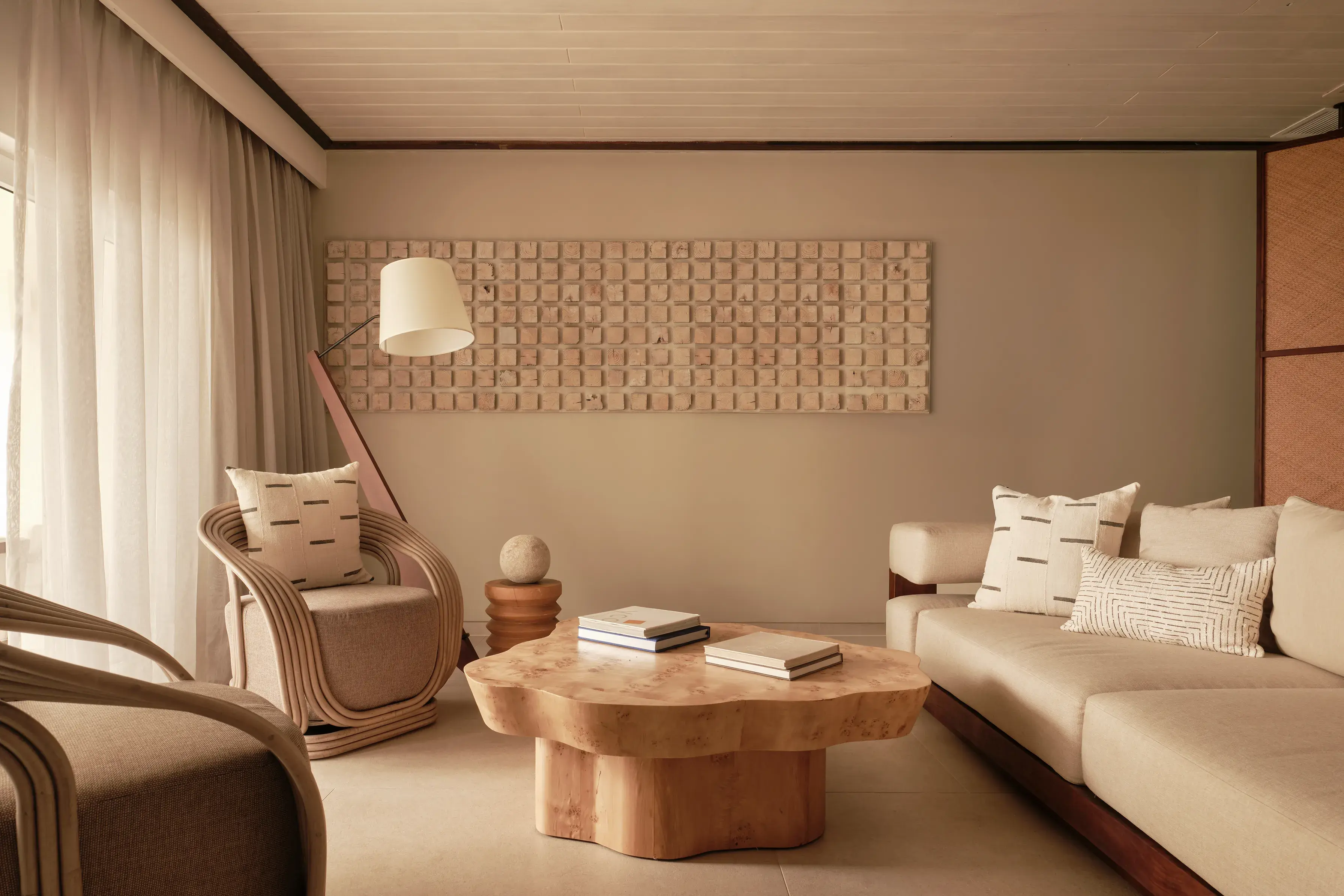 Bay Suite at Carlisle Bay in Antigua with warm neutral decor and soft furnishings 