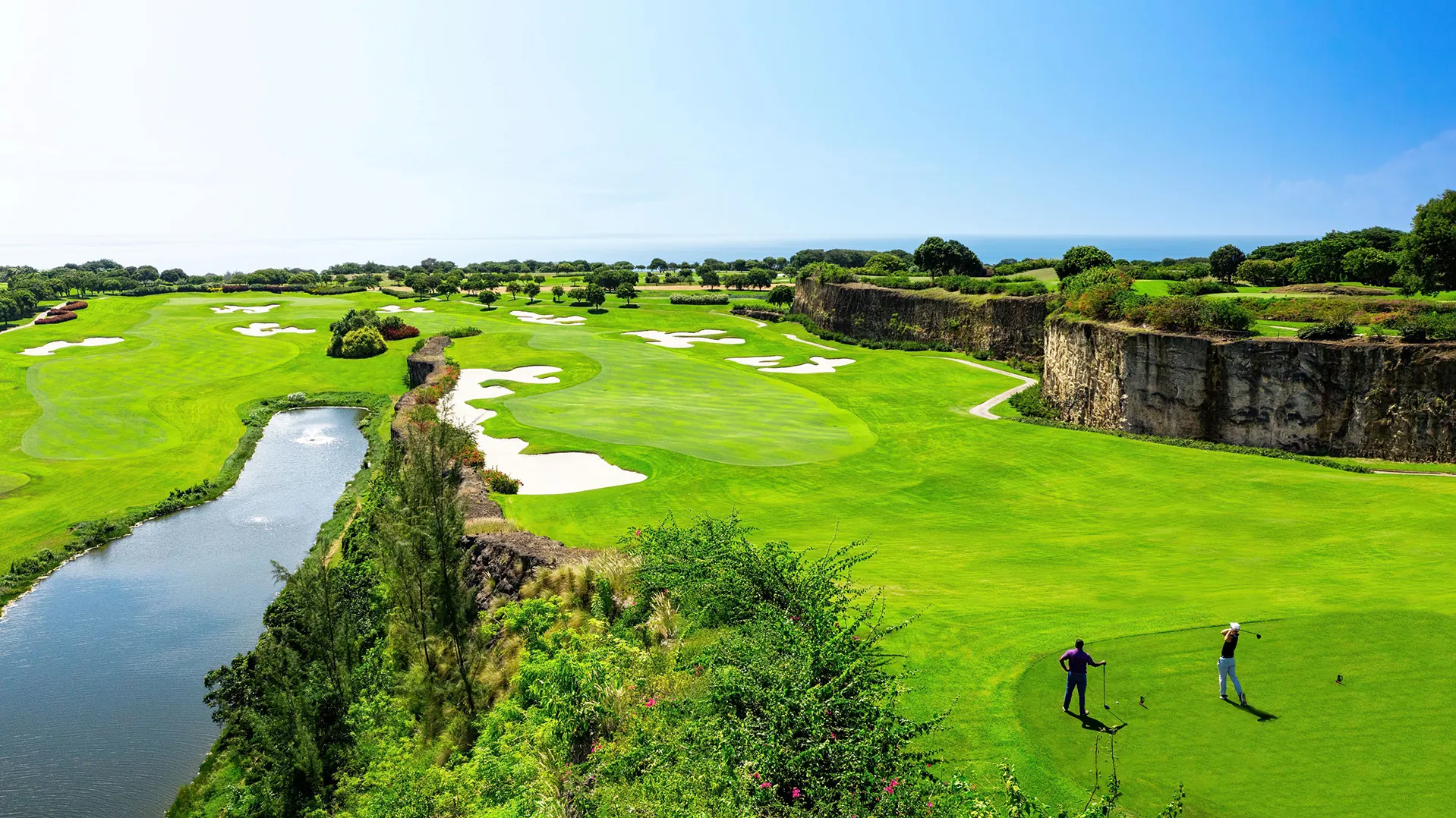 Caribbean, Barbados, Sandy Lane, two people playing golf on The Green Monkey golf course 