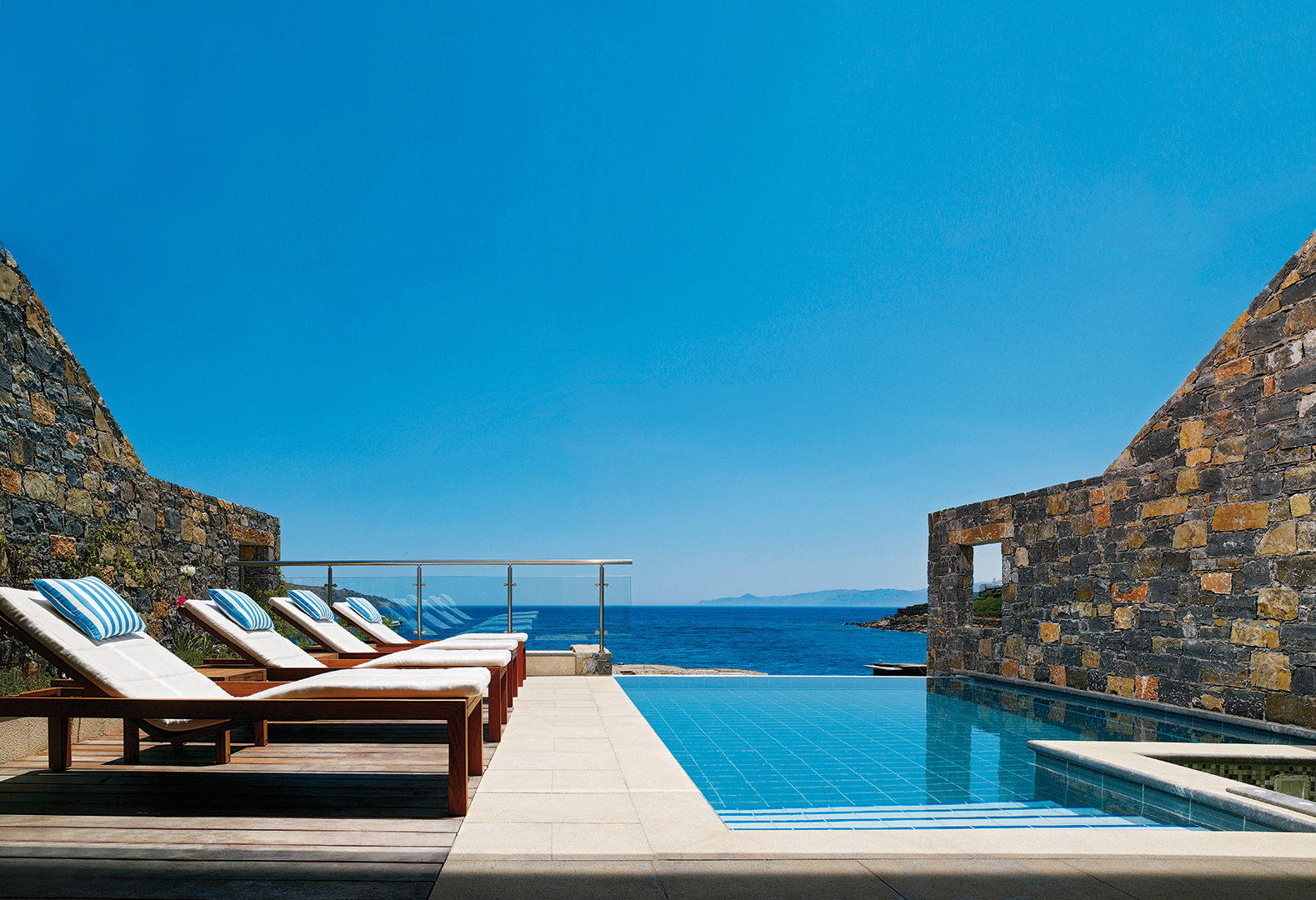 Europe, Greece, Crete, Elounda Peninsula All Suite Hotel, Diamond residence pool with loungers