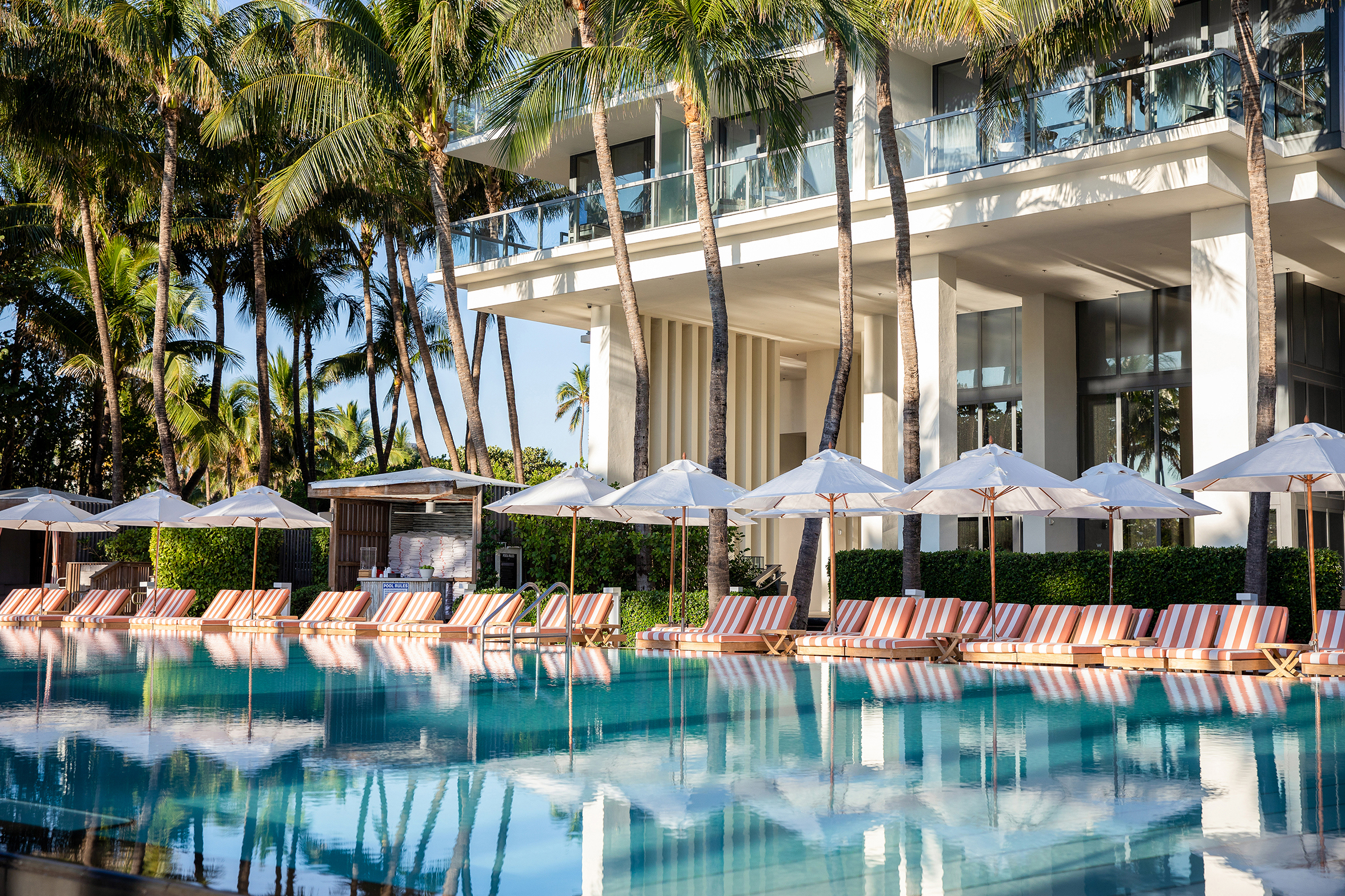 Striped sun loungers by the pool at W South Beach