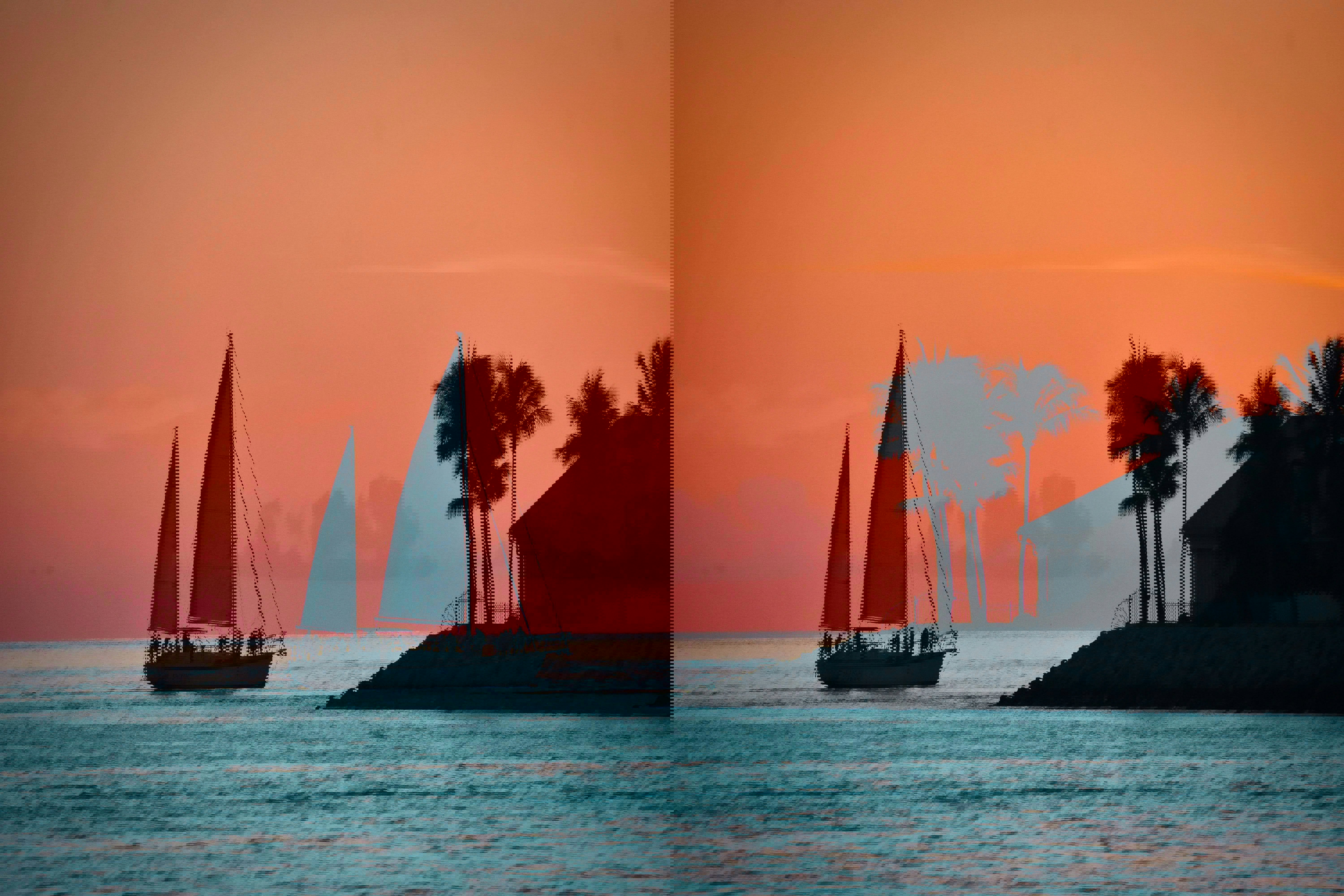 Sailboat crusing out at sunset in Key West