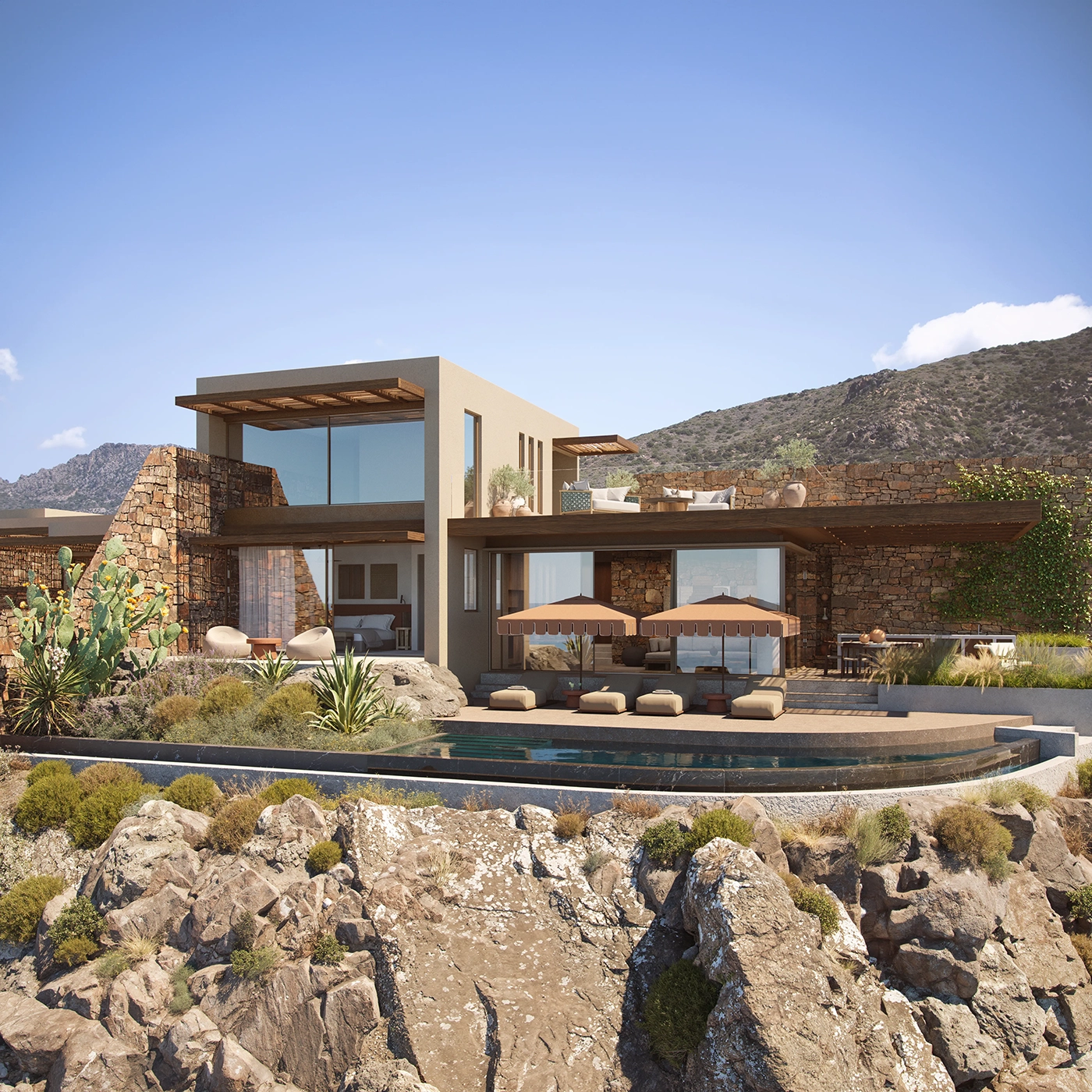 A luxury private villa exterior with a private pool and sun loungers on ground level and an outdoor terrace on the first floor level