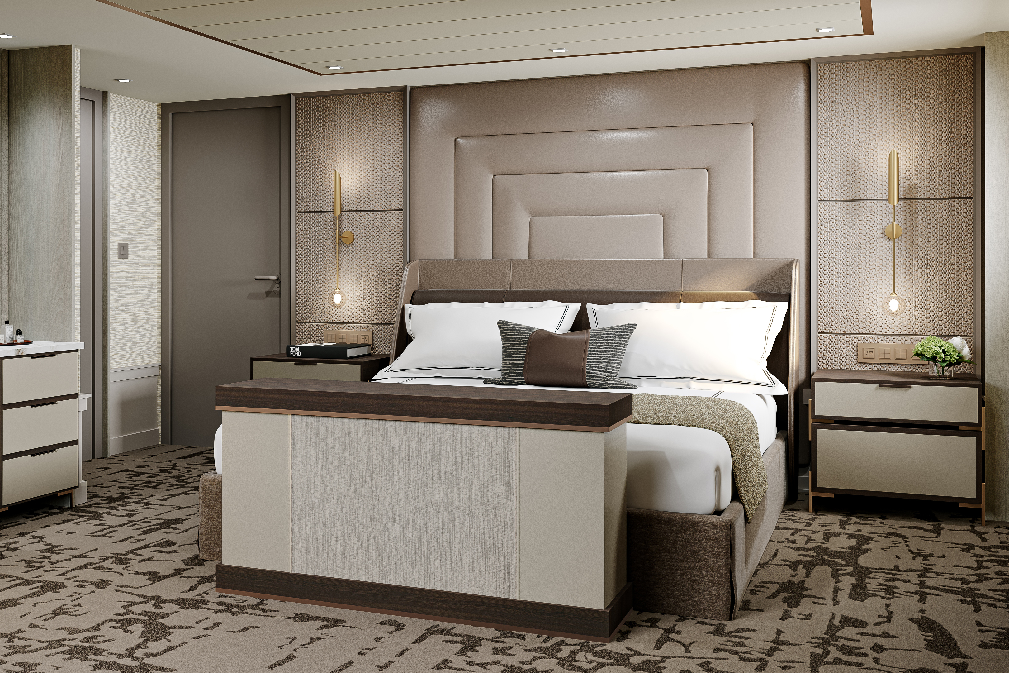 The sleek bedroom of a Grand Suite aboard Seven Seas Prestige with a comfy bed with neutral soft furnishings backed by a patterned wall with lights