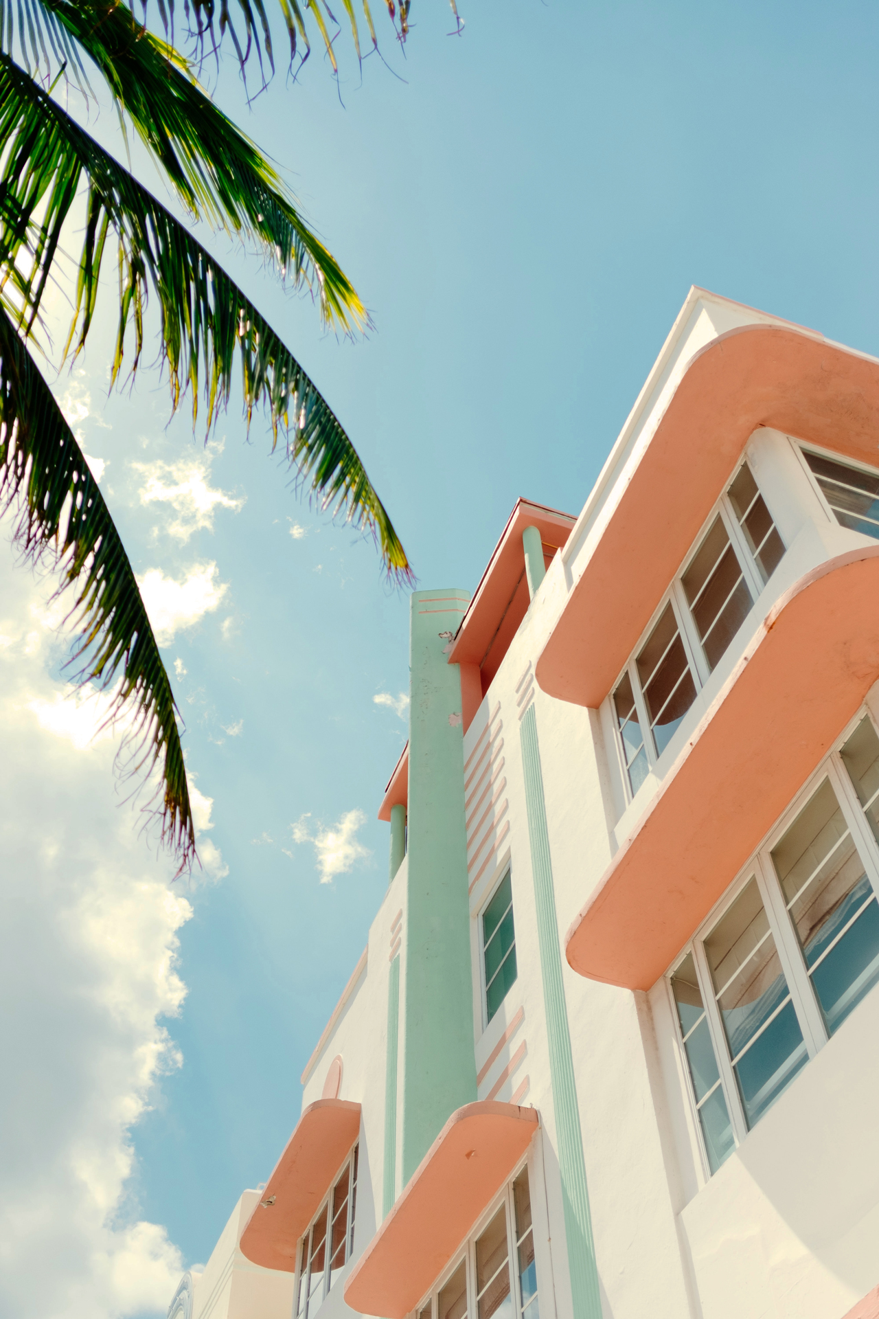 Low angle of a white and orange concrete building