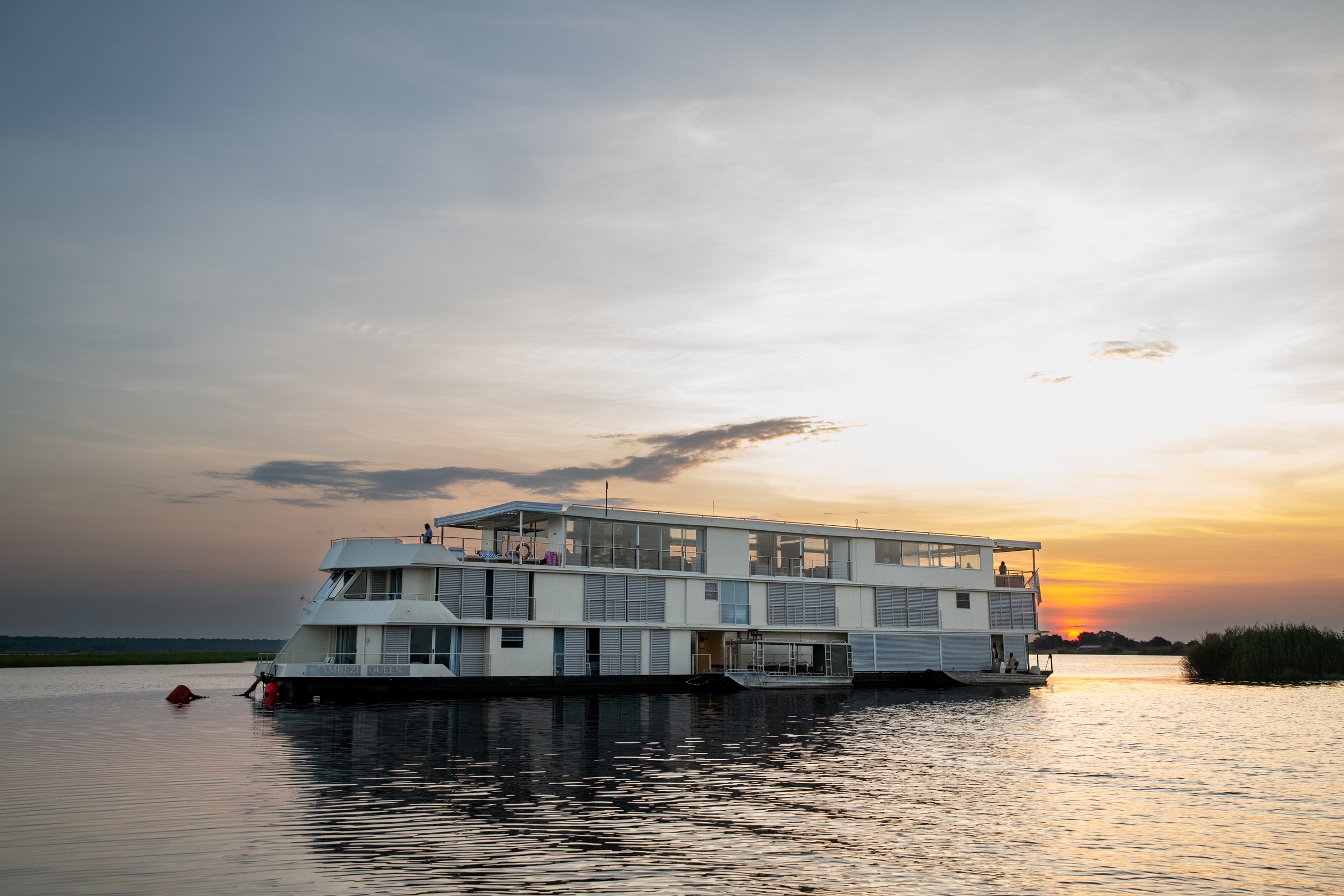 Zambezi Queen luxury river safari vessel at sunset on the Chobe River