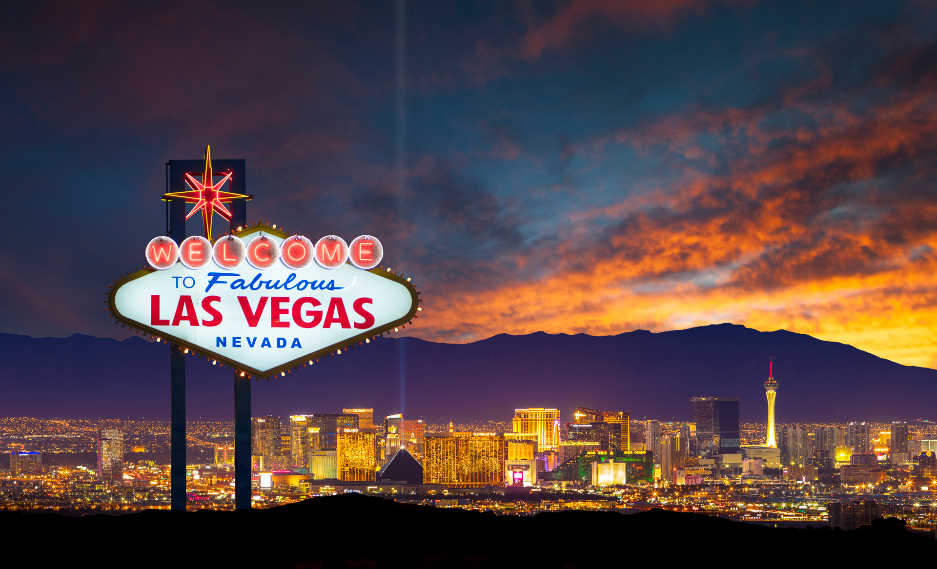 Photo of the Las Vegas city skyline and 'welcome to fabulous Las Vegas Nevada' sign