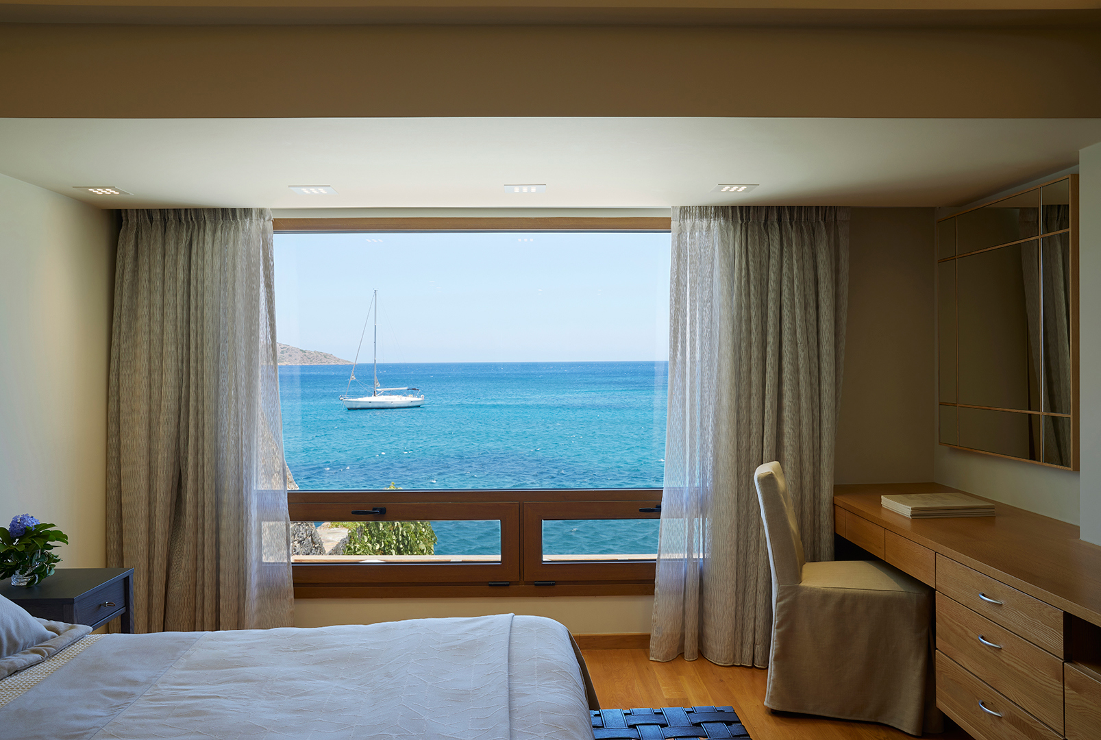 Europe, Greece, Crete, Elounda Peninsula All Suite Hotel, Bedroom with sea view