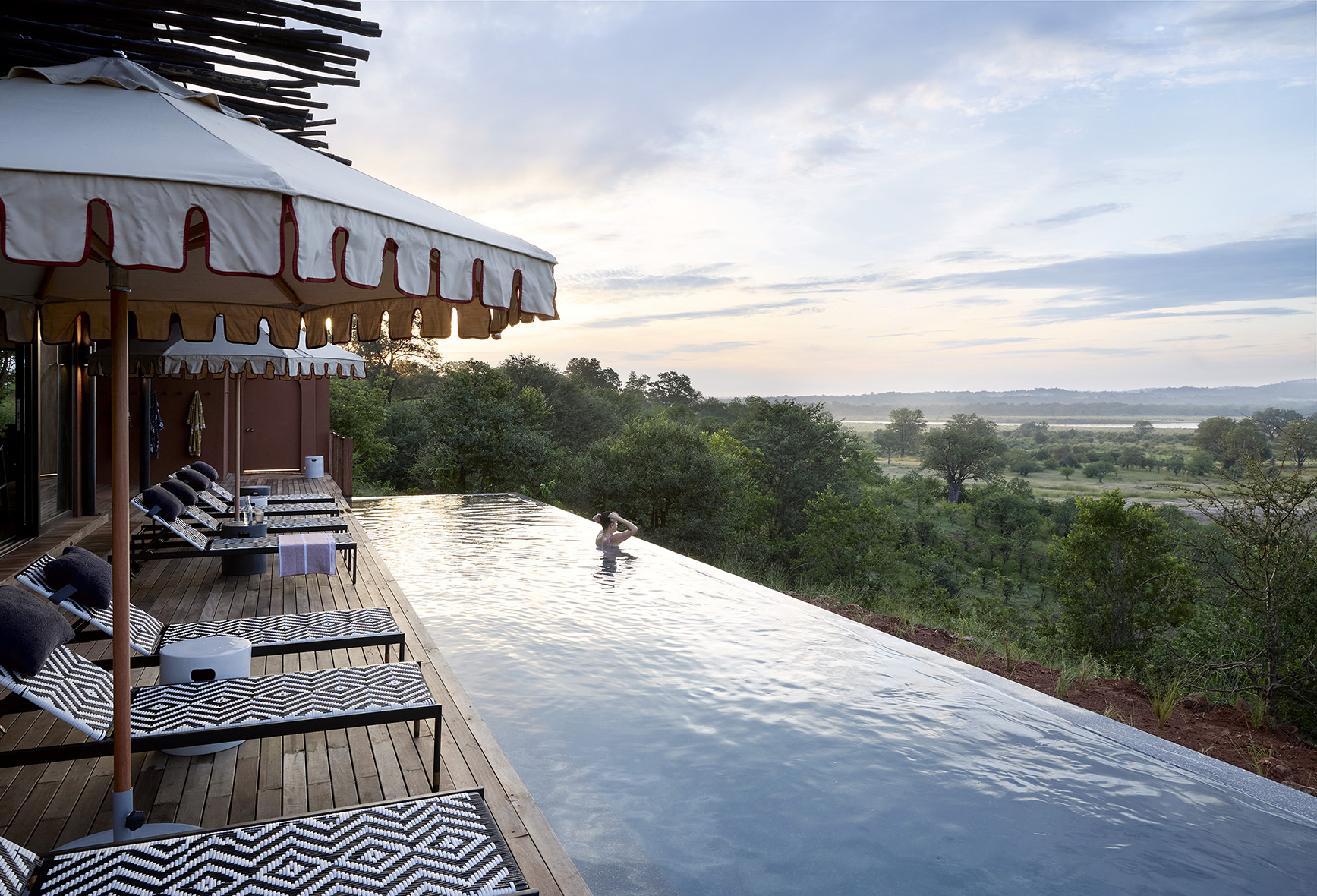 Afirca, Zambia, Chichele Presidential, woman in infinity pool