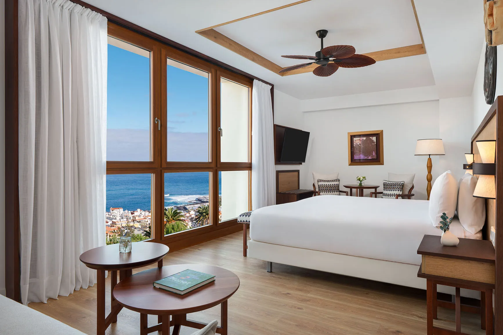Bright Junior room at Gran Hotel Taoro in Tenerife with modern décor, balcony views and natural light.