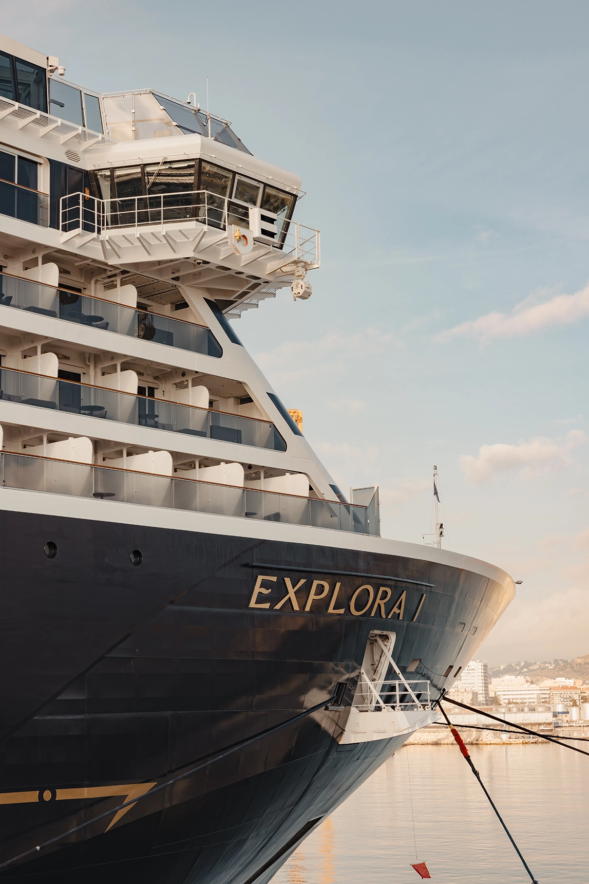 A close up image of the name on the side of the Explora I cruise ship